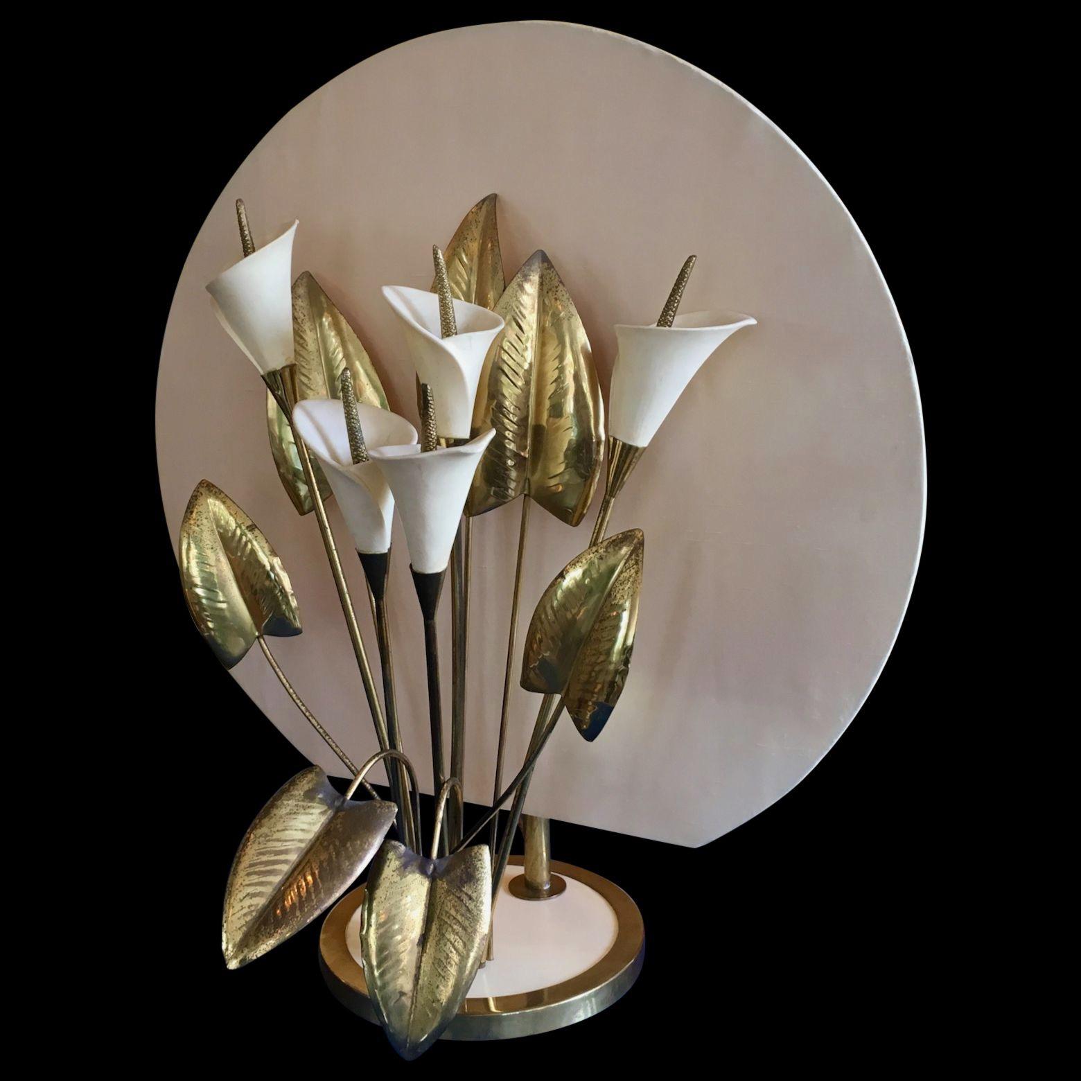 An unusual decorative and good quality table light. the brass leaves and bisque lillies can be repositioned and rearranged as needed. The background is ivory silk and can also be recovered in any color you like, 
Florence, Italy, 1960s-1970s, manner