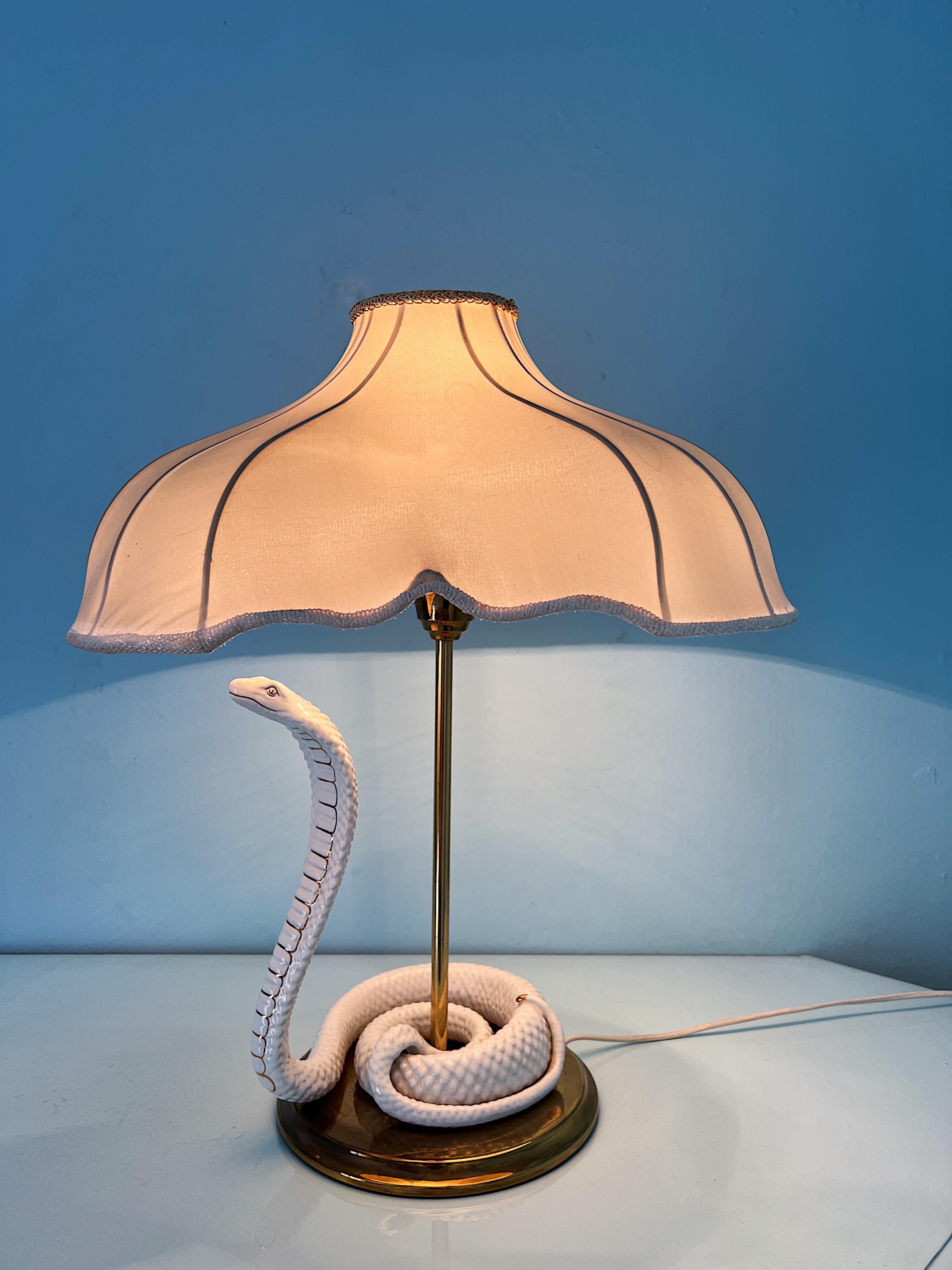 Hollywood Regency Table light with ceramic cobra designed by Italian manufacturer Ahura, 1960s  For Sale