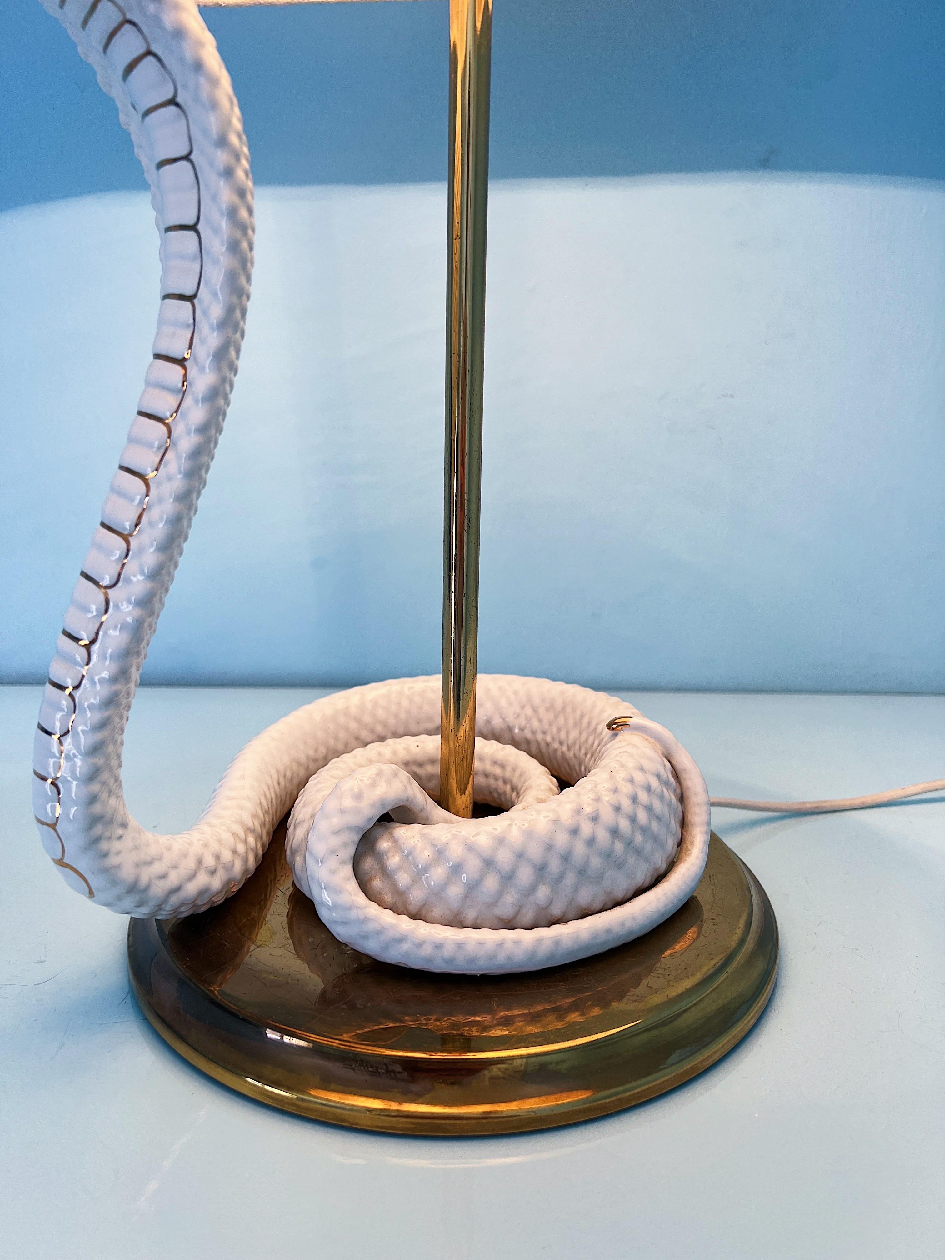 20th Century Table light with ceramic cobra designed by Italian manufacturer Ahura, 1960s  For Sale