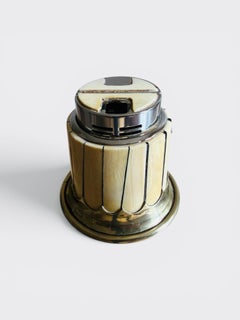 Table lighter by Anthony Redmile.