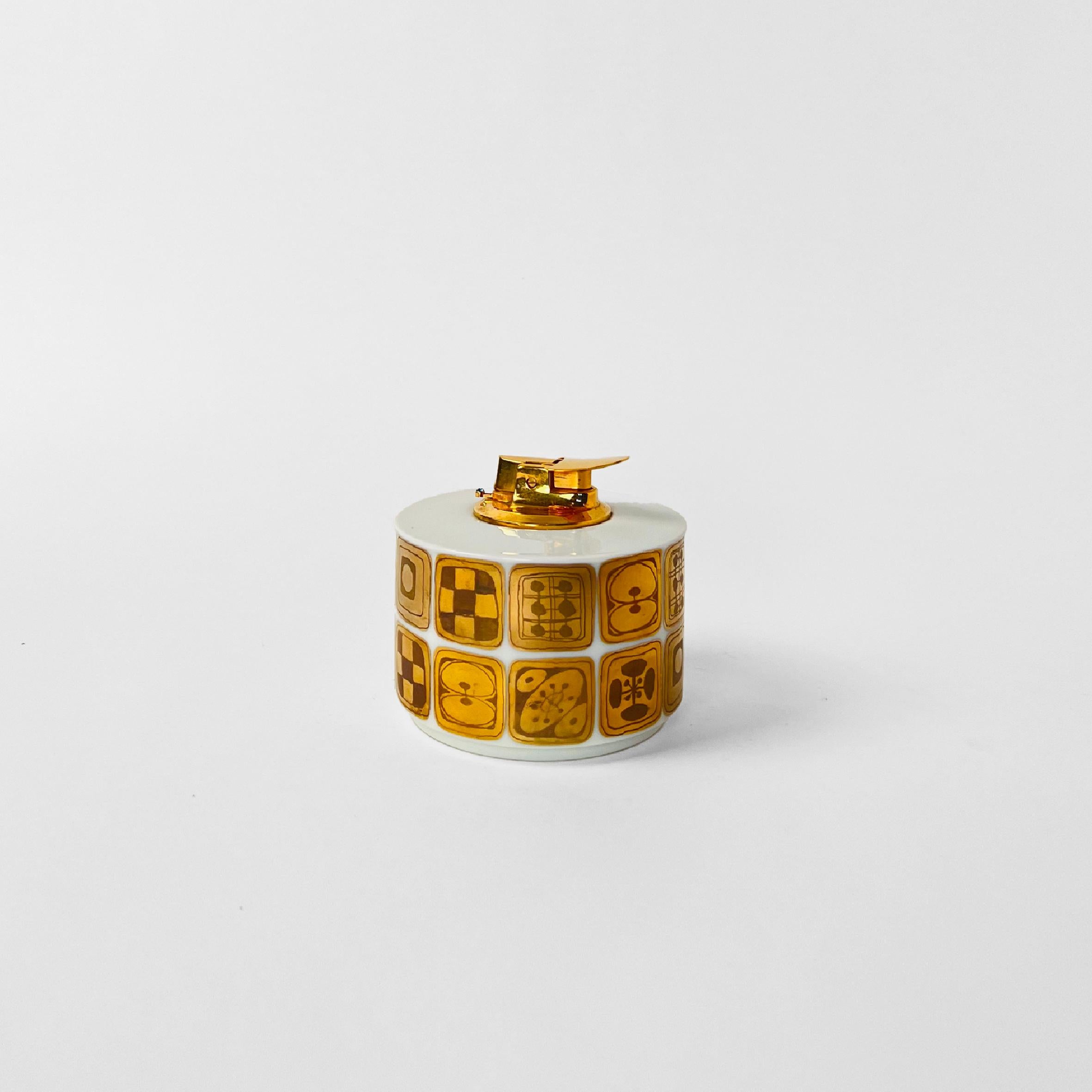 Table lighter with golden pattern. Designed by Bjørn Wiinblad for Rosenthal. Made in Germany in 1961.