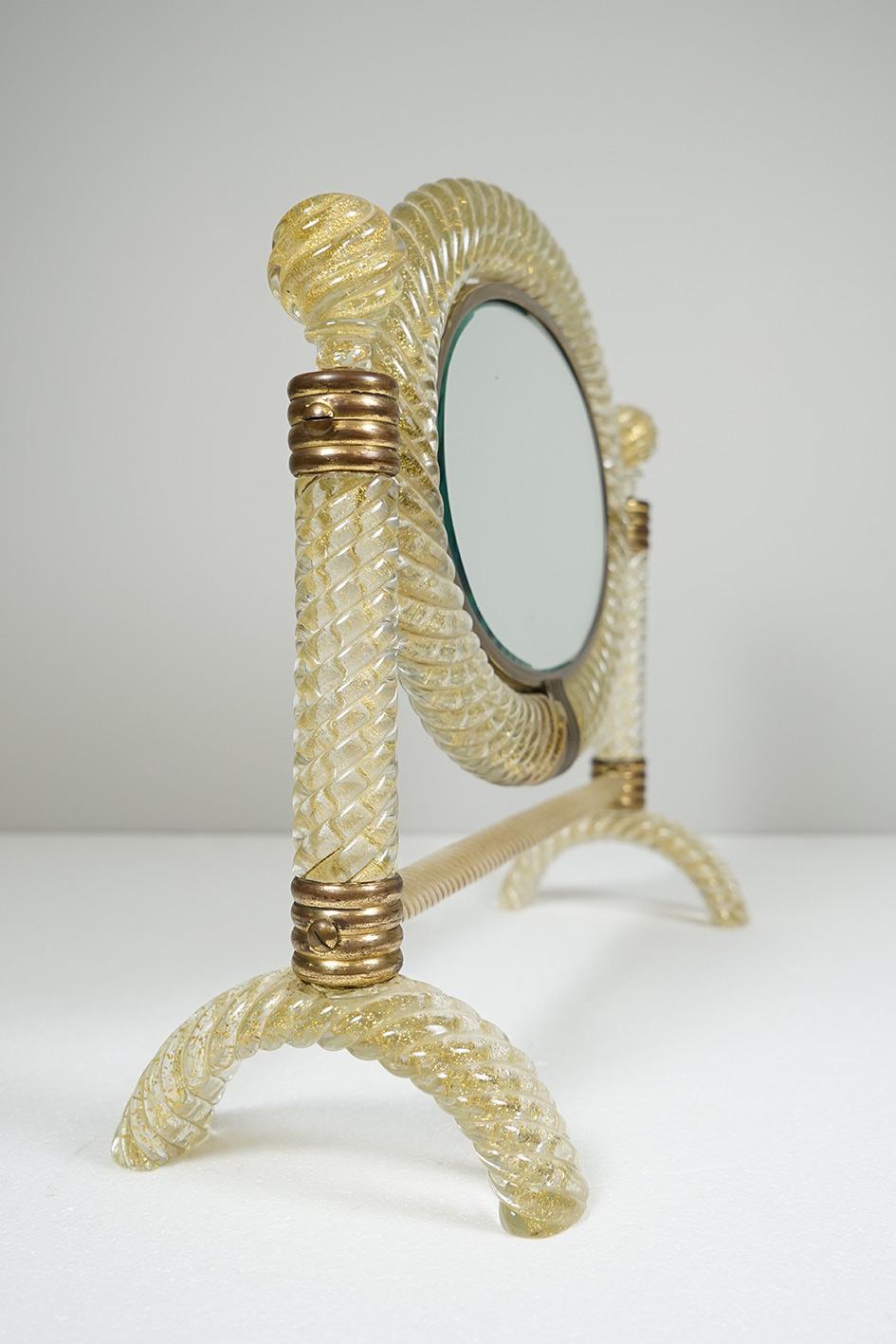 Table mirror by Archimede Seguso, circa 1940.
'Twisted rope' Murano glass.

Label retailer back side.