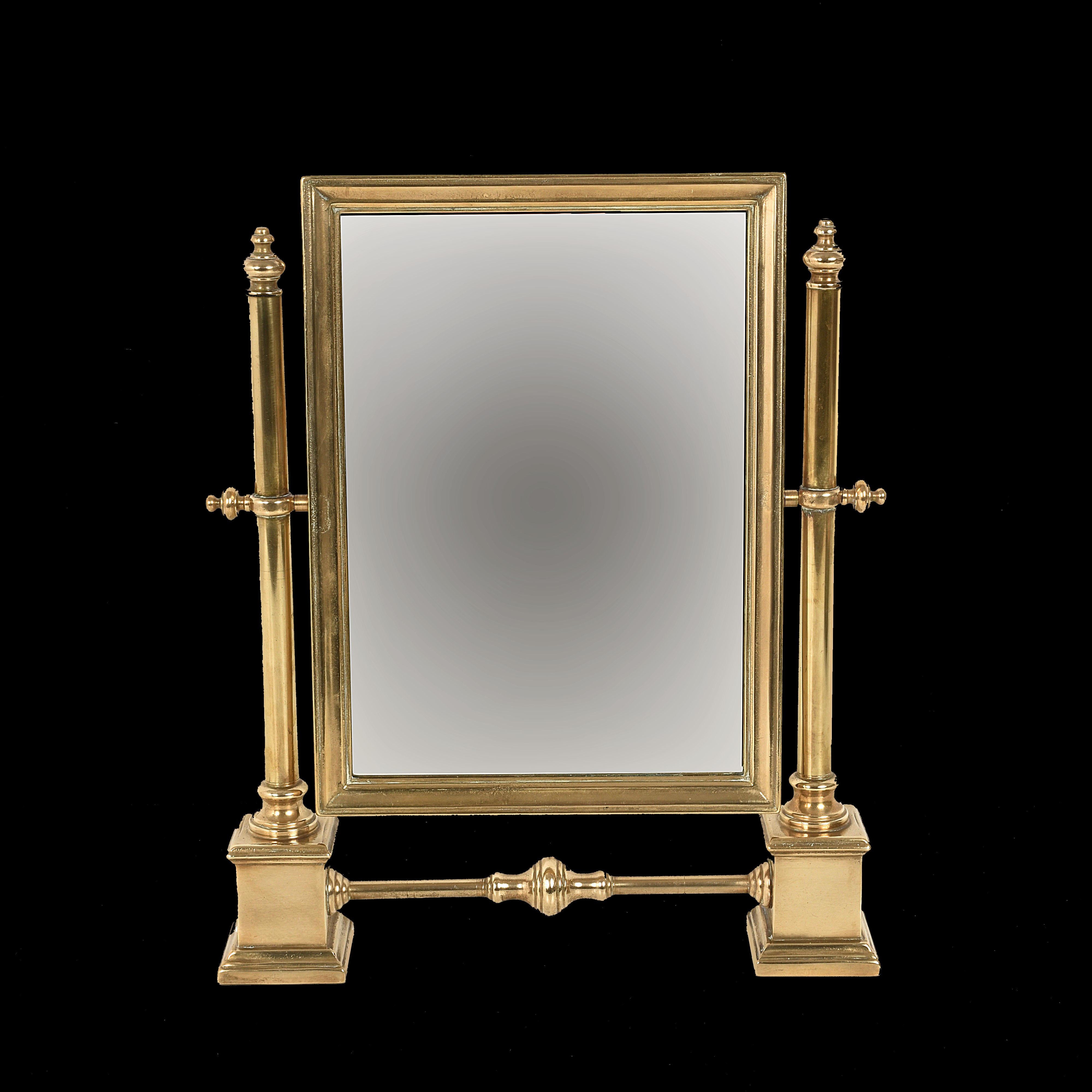 Table mirror in brass, vanity, adjustable.

This elegant table or make up mirror was designed and manufactured in Italy in the 1950s. The mirror has a solid two-column brass structure. Measurements: 13.7 inches (35 cm) 16.3 inches (41.5 cm) 2.5