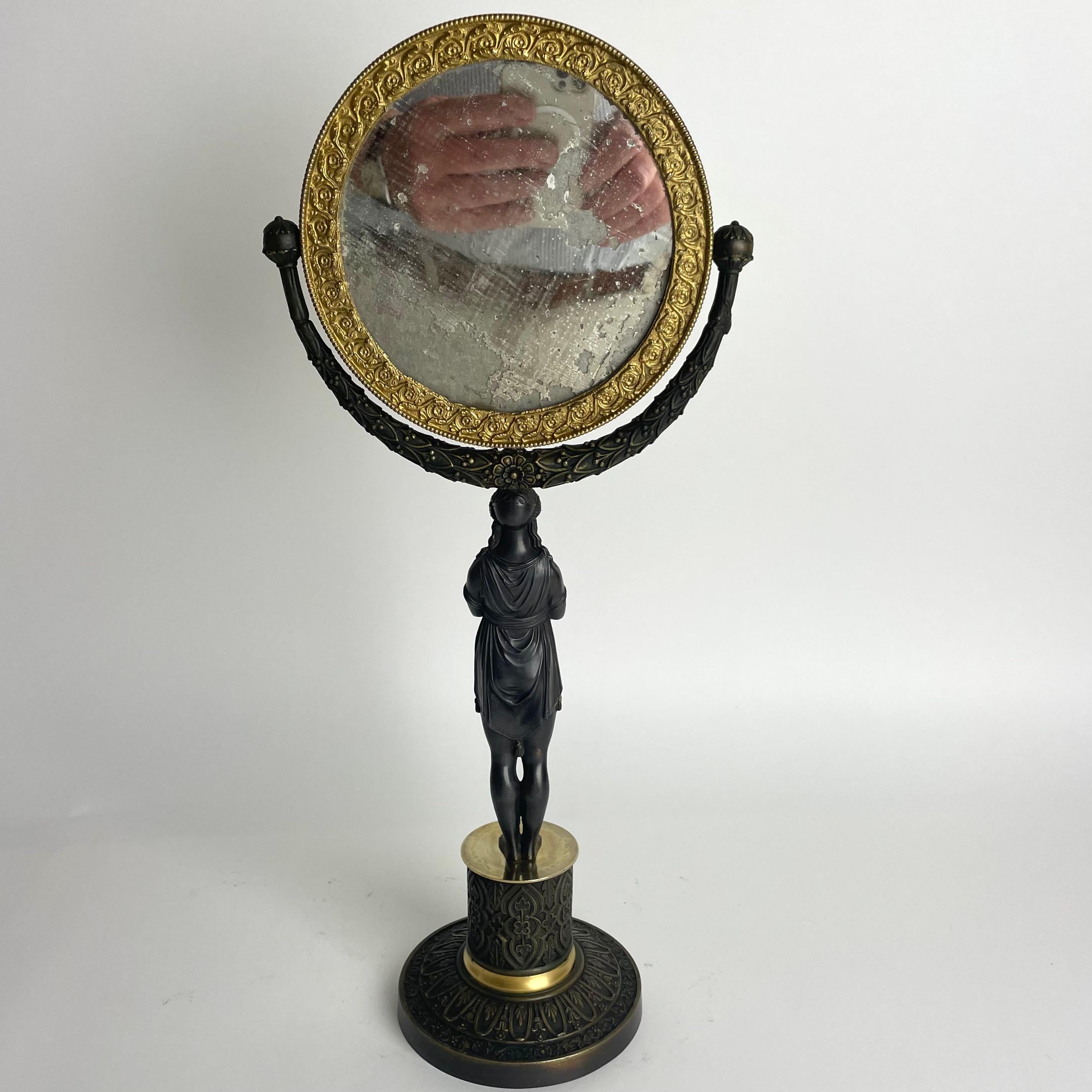 Doré Miroir de table avec cariatides dans l'Empire français. Bronze doré et patiné foncé en vente