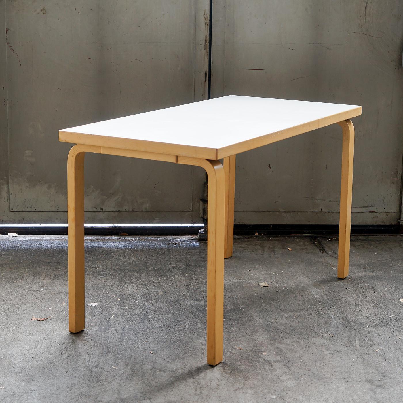 This original table, model 80A was designed by Alvar Aalto in 1935 for Artek, Finland. It is one piece of the famous L-leg-collection and is made of finish birchwood. The legs are bended in a special developed technique. The 4cm tabletop is veneered