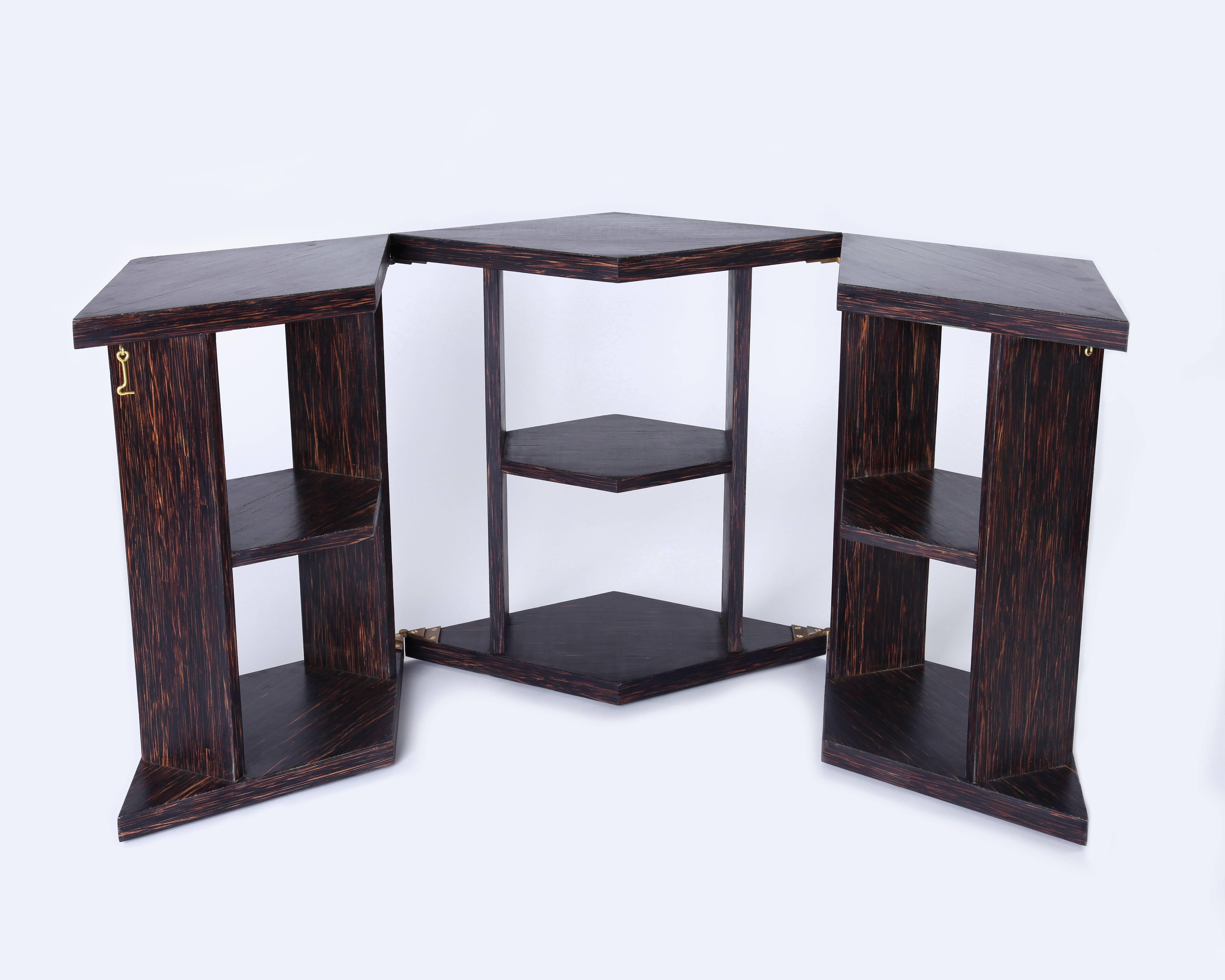 Edition Modern's re-edition of the three elements table or bookcase designed by Eugene Printz, in 1928.
Shown in satin palm wood. Other wood and finishes available.
Solid brass hinges.
Made to order. Production time is approx. 8/10 weeks
Also