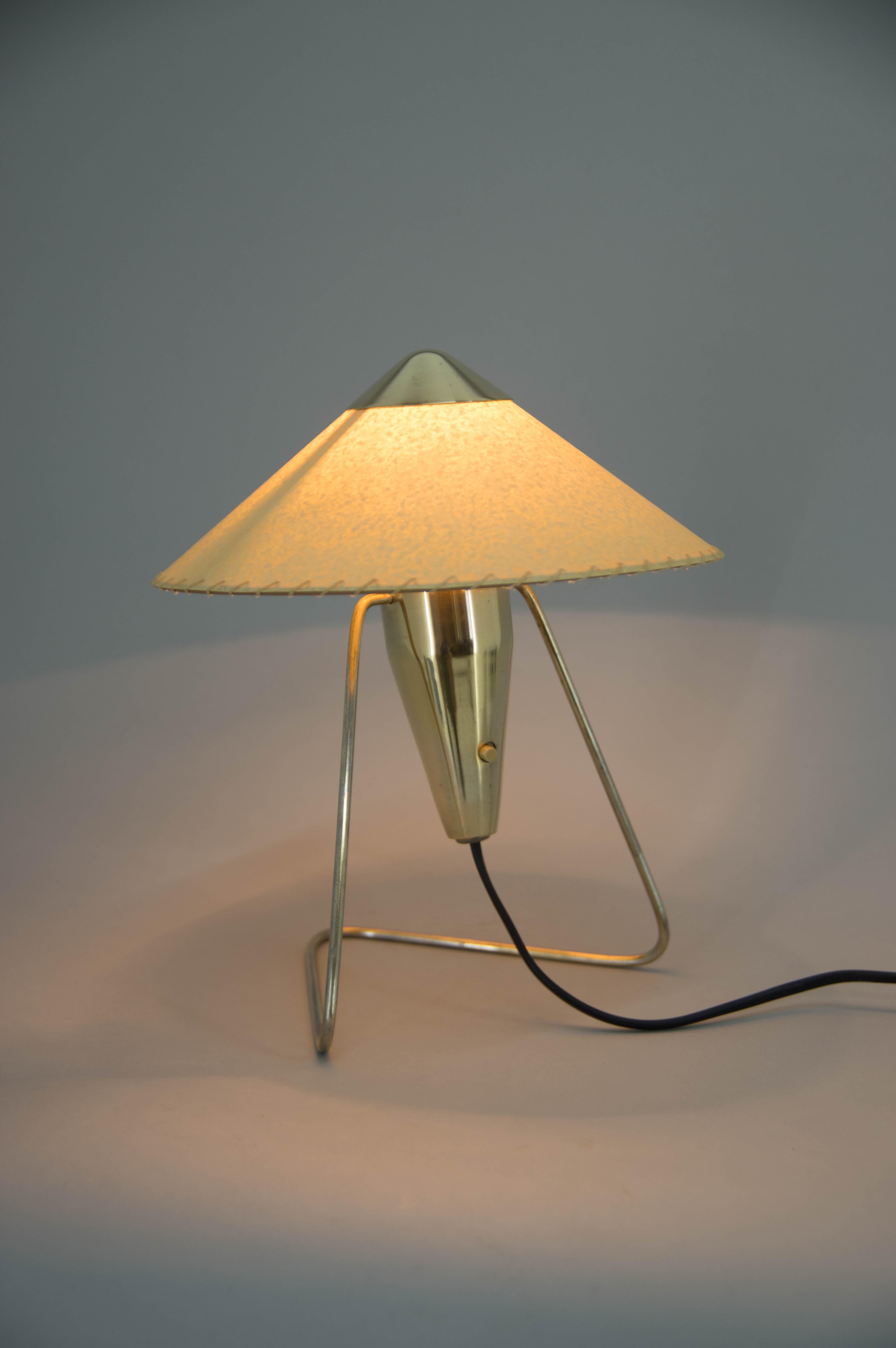 Table or wall lamp designed by Helena Frantova for OKOLO, Czechoslovakia. Brass polished. New parchment paper shade. Rewired: 1x40W, E12-E14 bulb.
US plug adapter included.