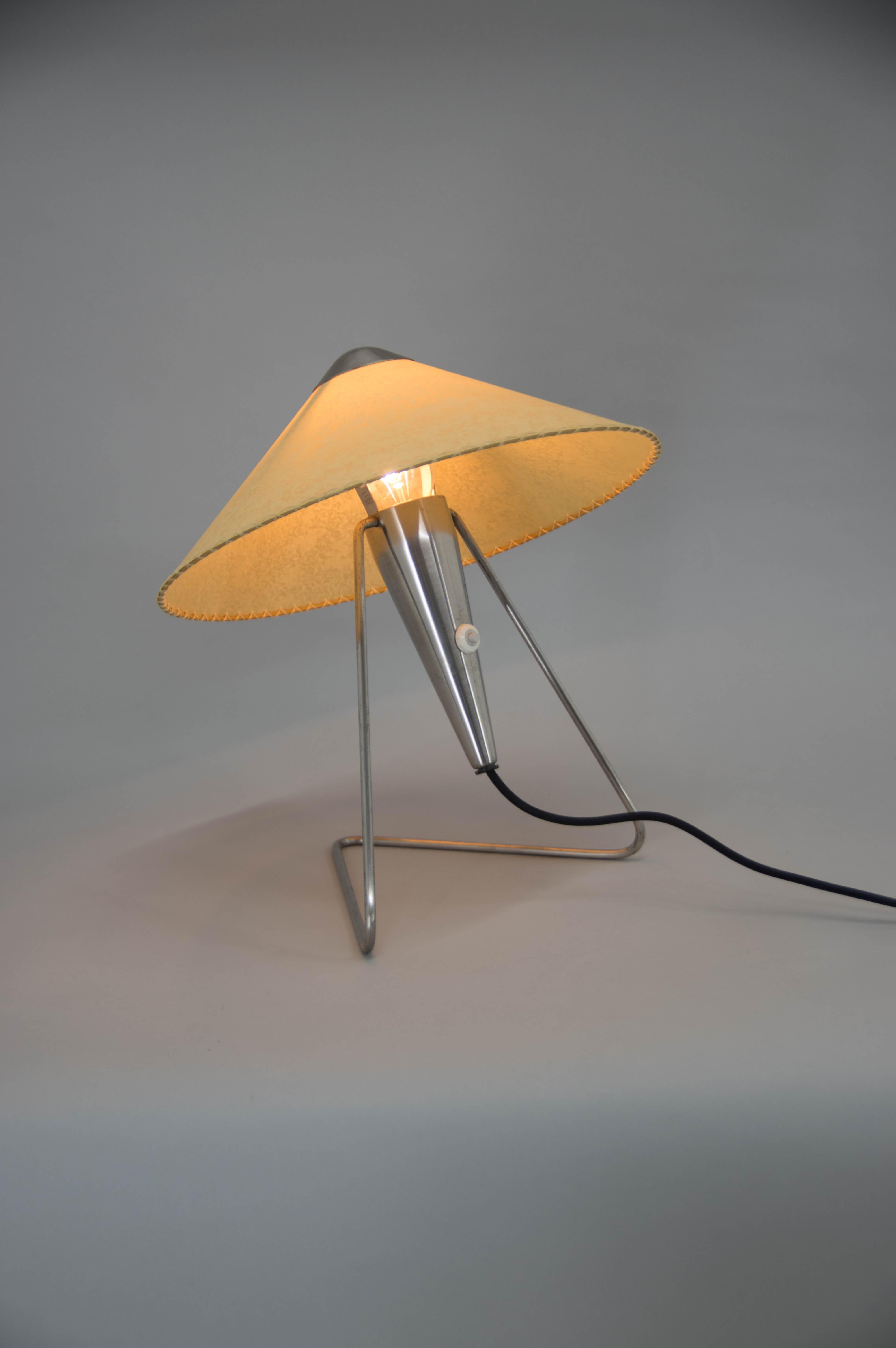 Table or wall lamp designed by Helena Frantova for OKOLO, Czechoslovakia. Perfect condition. New parchment paper shade. Rewired: 1x40W, E25-E27 bulb.
US plug adapter included.