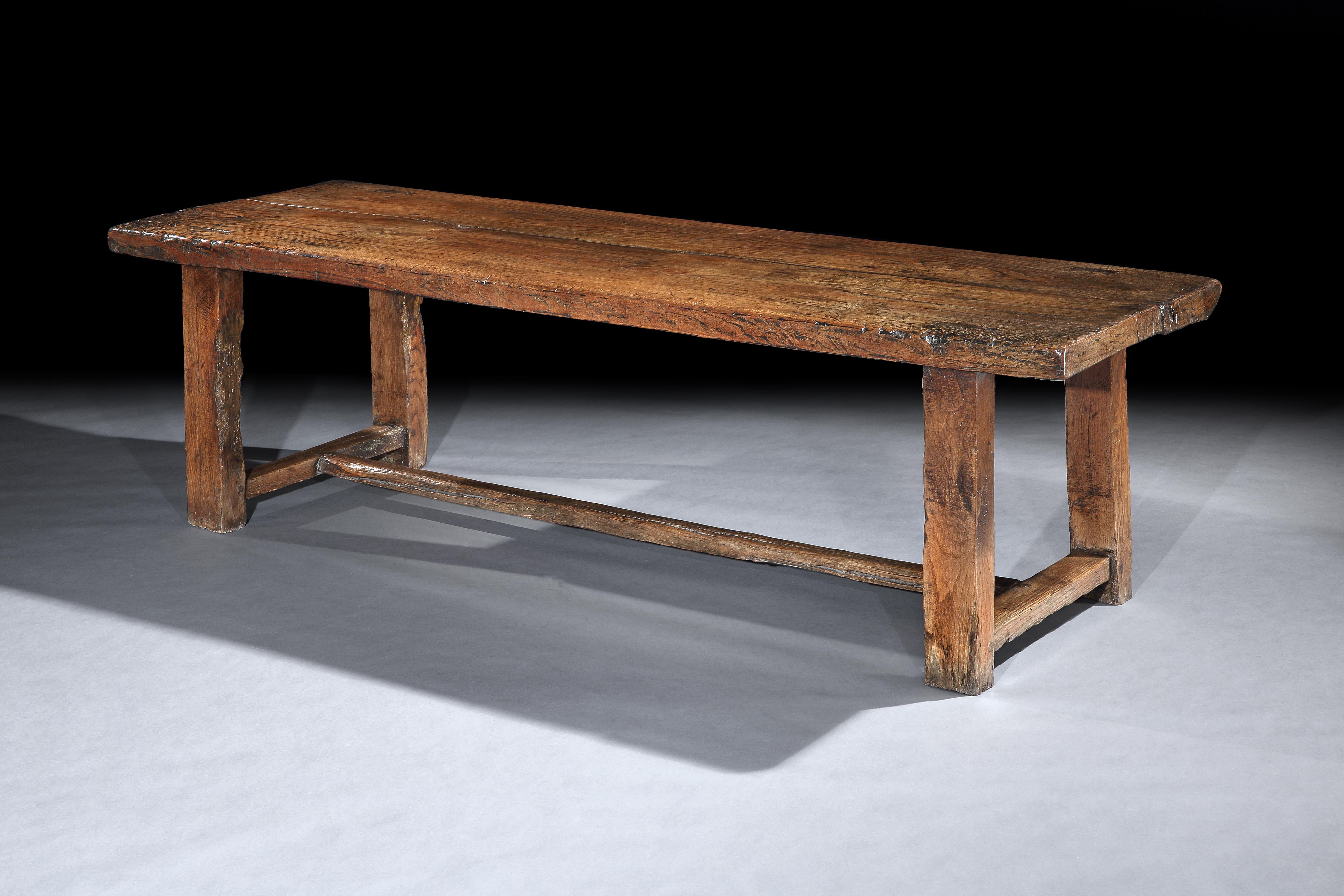 Just purchased more information coming soon

Exceptional figuring, condition, color and patina
Comprising two planks one 17.5” 44 wide the other 14” 36 cm

Tables made from massive boards of oak or elm were the most common type of early dining table