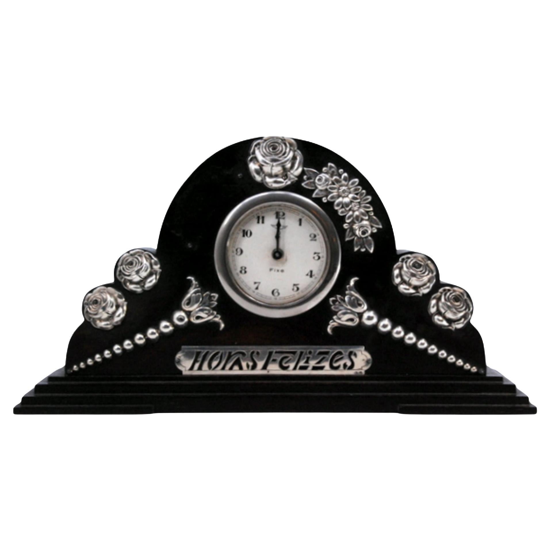 Table regulator clock with silver applications