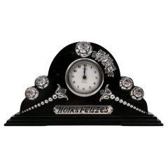 Table regulator clock with silver applications