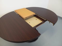 Table ronde de repas vintage en bois d'ébène et métal chromé style AGE