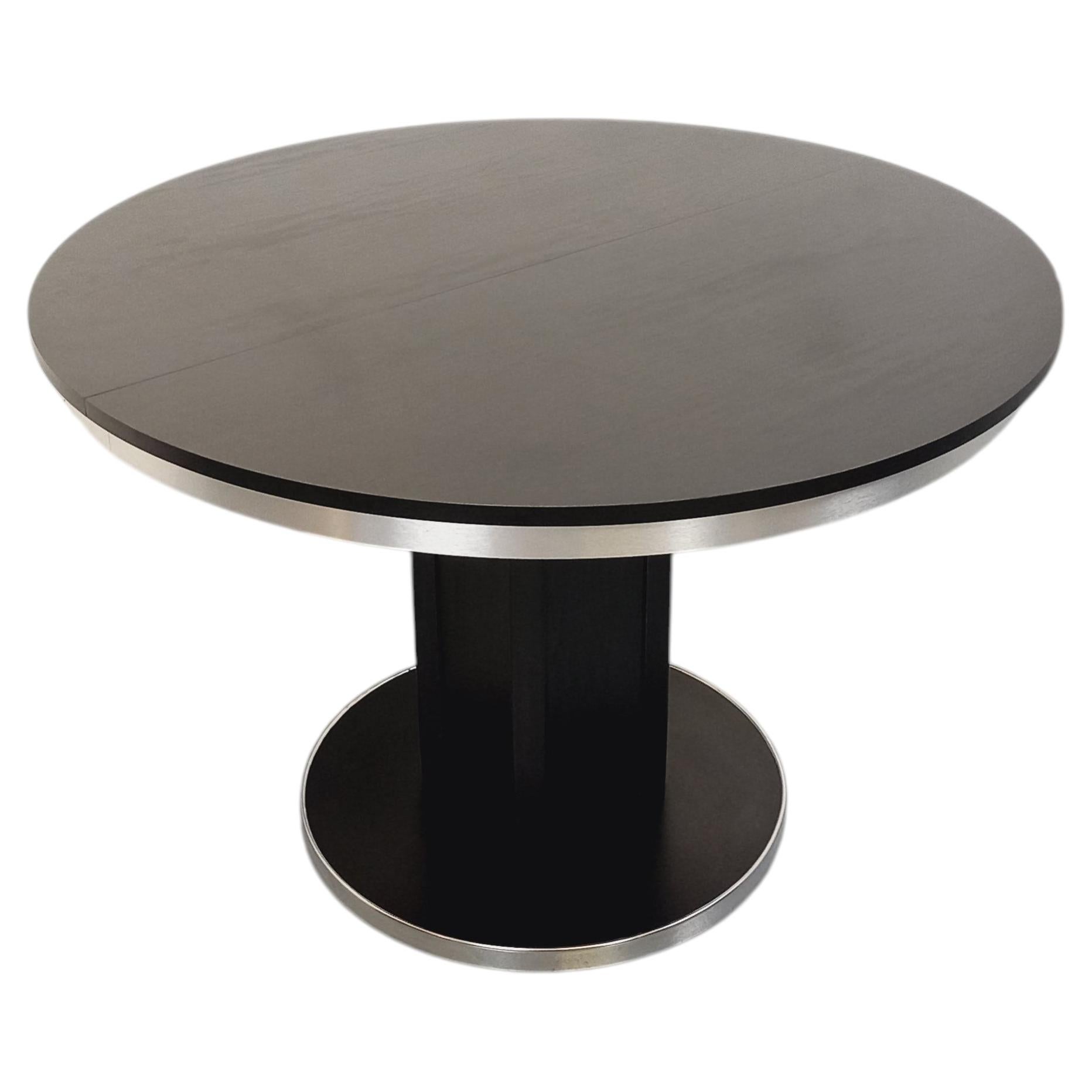 Table ronde de repas vintage en mélaminé esprit bois noir et métal chromé For Sale