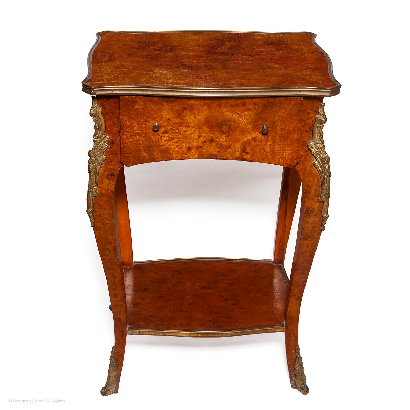- Elegant small size and sweeping form
- Stunning burr walnut veneers, rich color and patina
- Sophisticated gilt bronze band and acanthus leaf mounts
- Injects gravitas into any interior
- Perfect for a boudoir, dressing room, bedroom, living