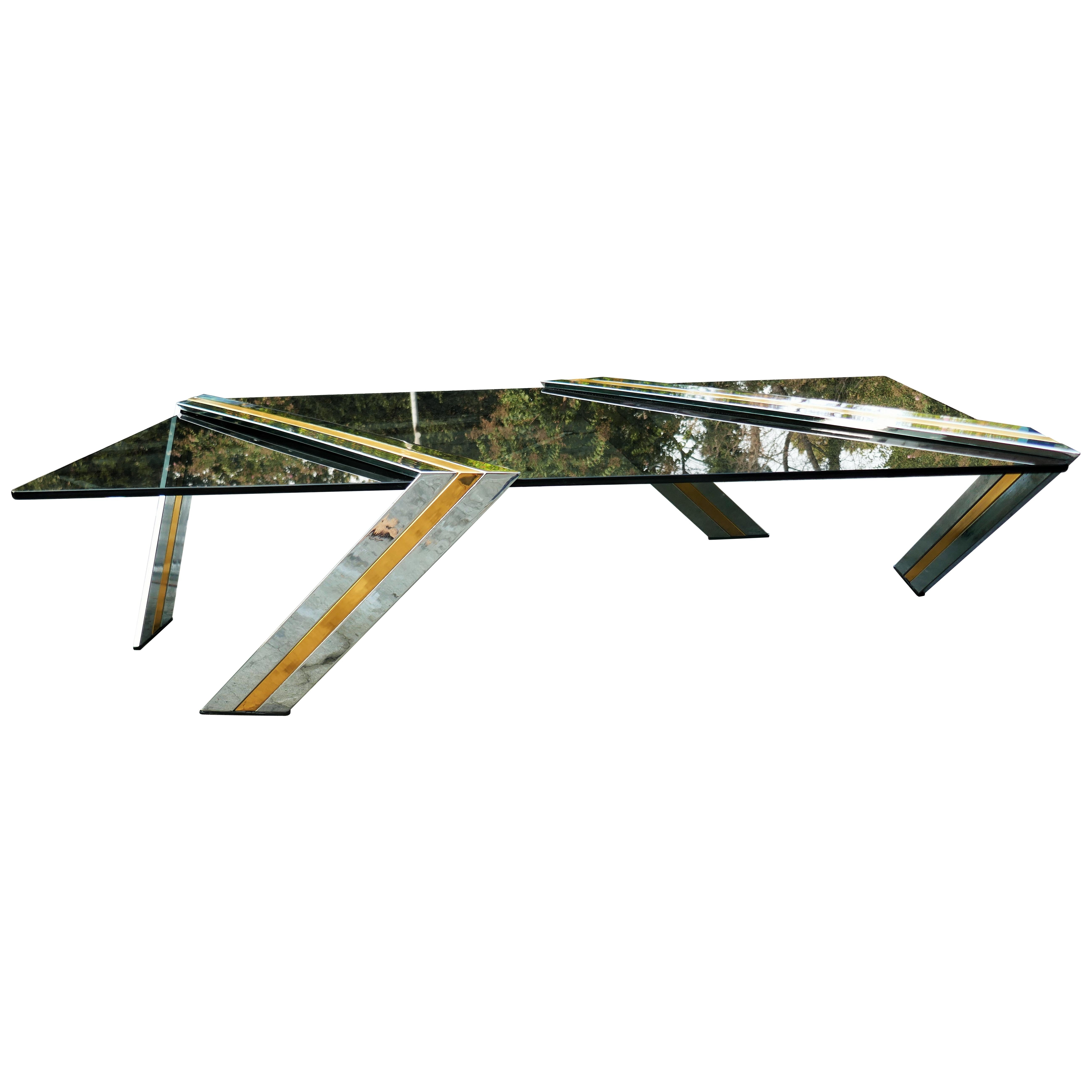A sculptural table in the style of Willy Rizzo.
The glass is self-supporting with steel and brass bases.
There are no screws to fix the glass
Glass size 120 60 1 centimeters
Two micro defects in one corner of the glass
Good condition.
Thank you.