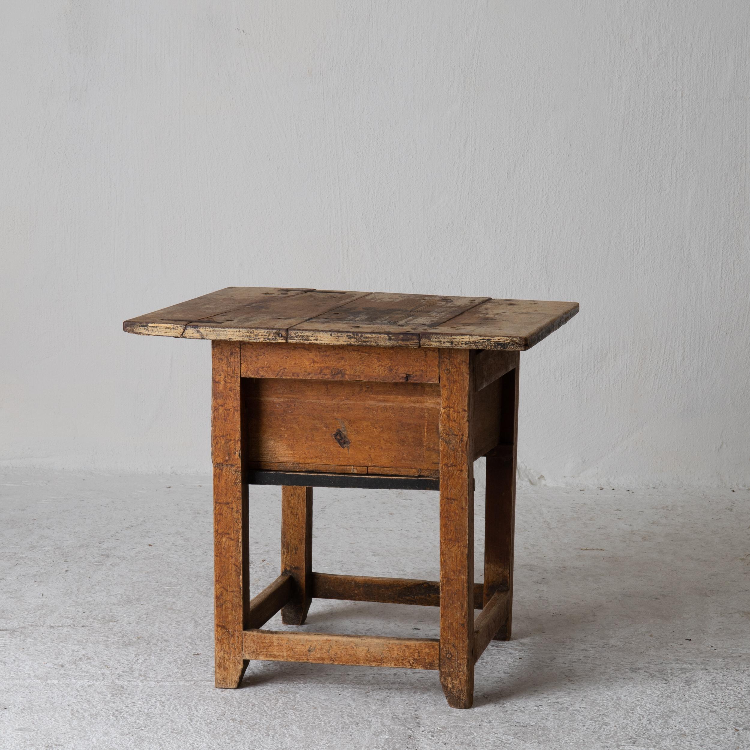 Table side table Swedish 19th century yellow drawer Sweden. A side table made during the 19th century in Sweden. Yellow paint in a rustic look with a beautiful patina. Drawer in frieze. Original hardware.