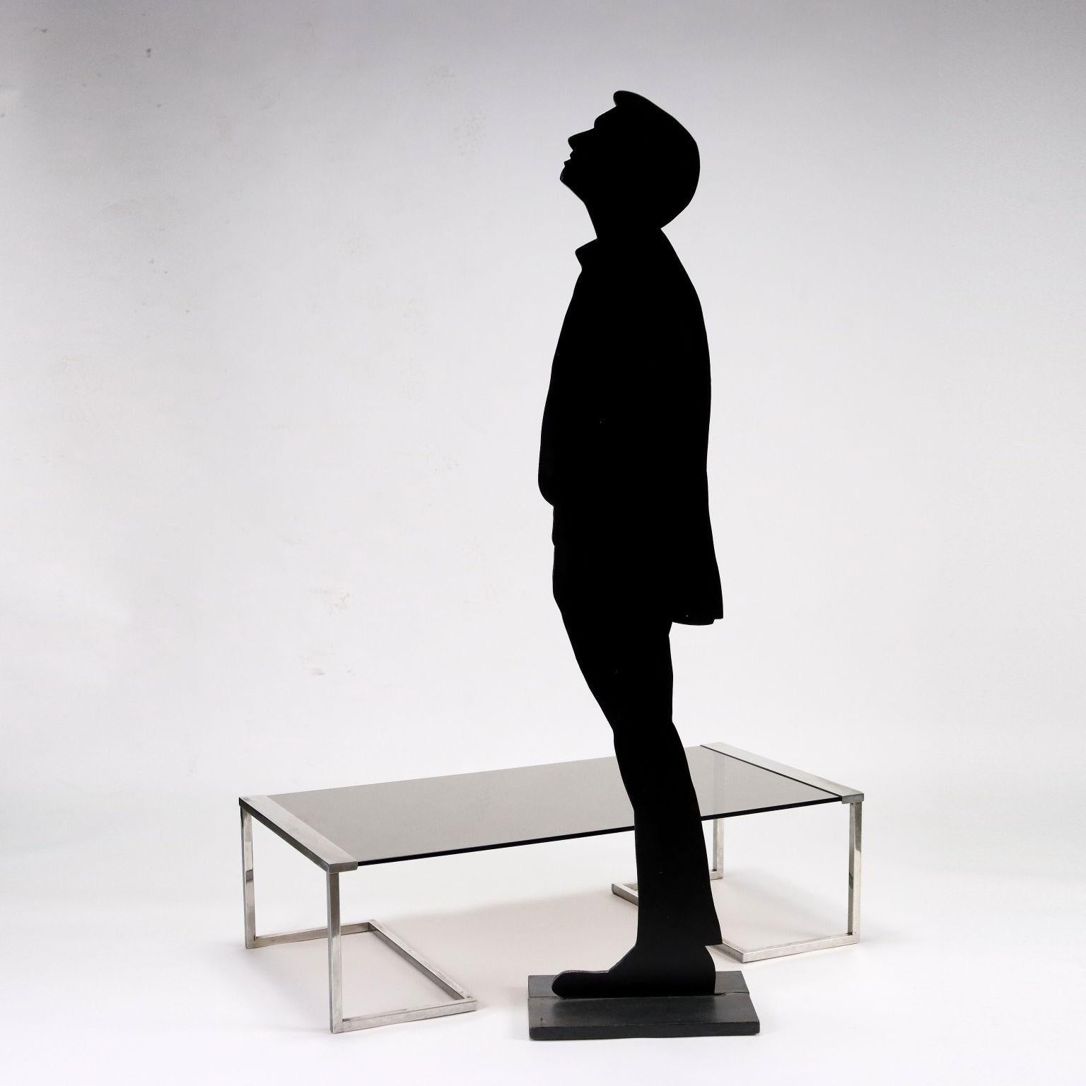 Coffee table, chromed brass structure, smoked glass top.