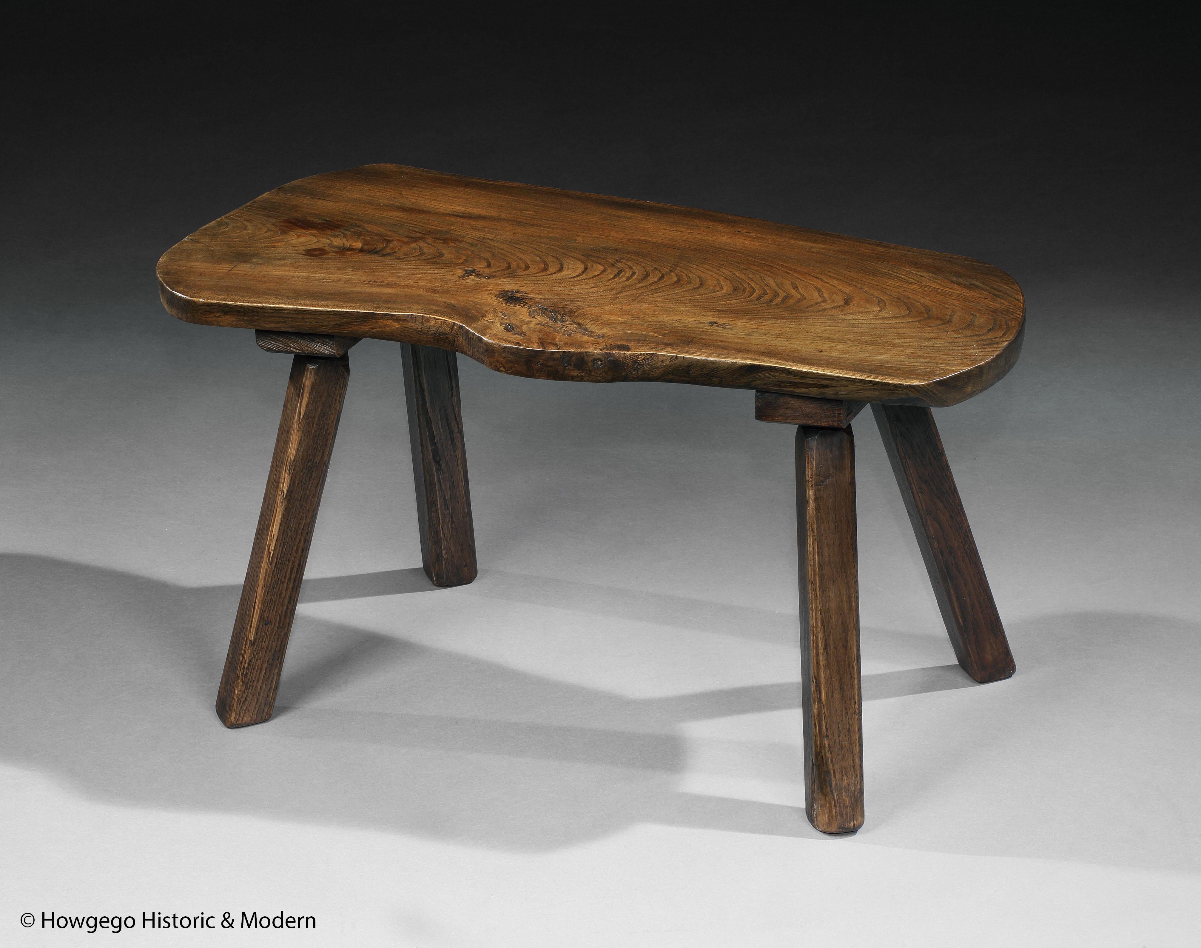 - Sculptural table using the natural characteristics and form of the elm as the inspiration to create furniture that transcends purpose into organic art.
- The patina and wear that have developed with time add to the raw, organic character of this