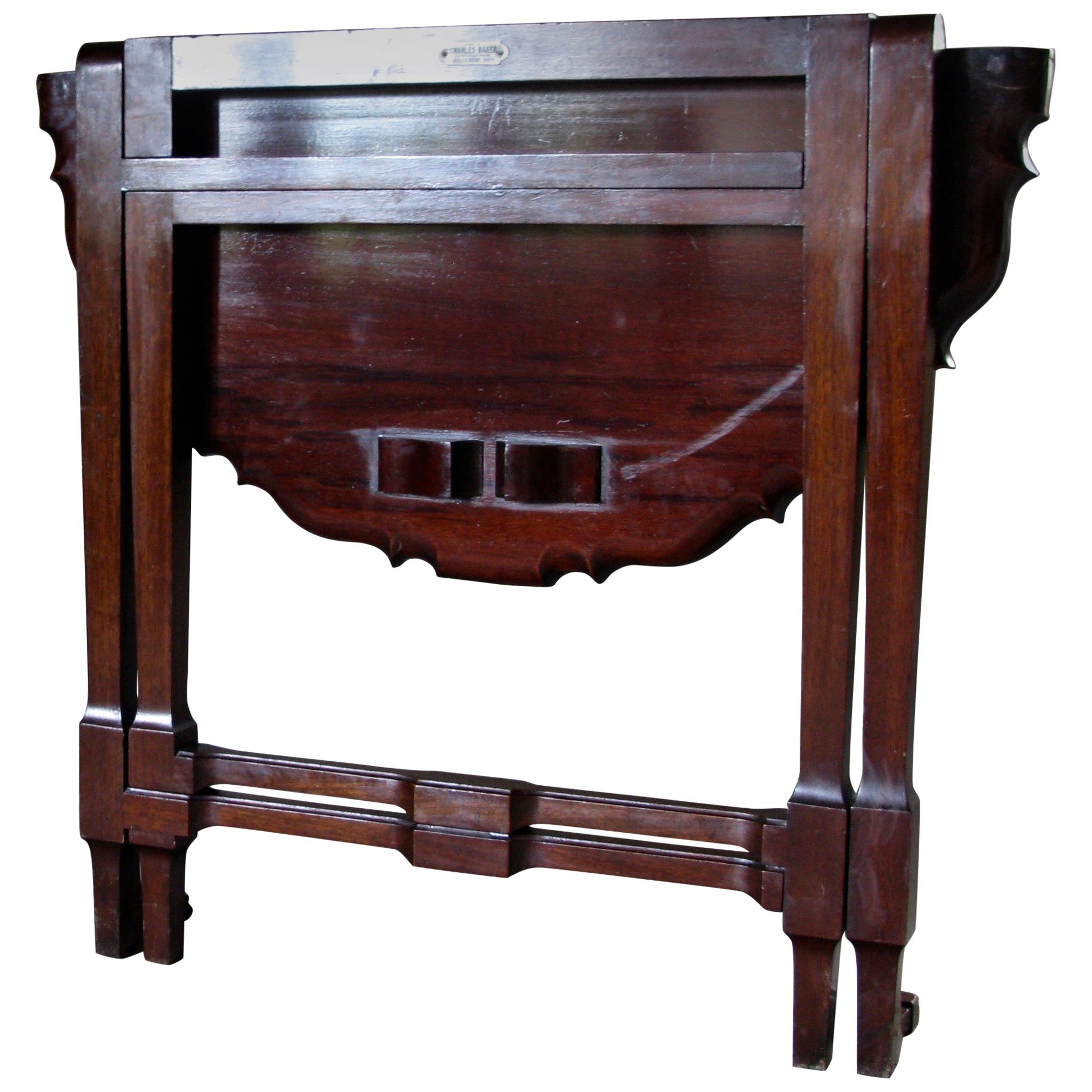 Beautiful signed, Charles baker, Bath, mahogany side table, drop-leaf table

A quality piece of Cuban mahogany

Charles Baker (1841-1932) h1 Charles Baker (1841-1932) was a Bath cabinetmaker and part of an important family of cabinet makers