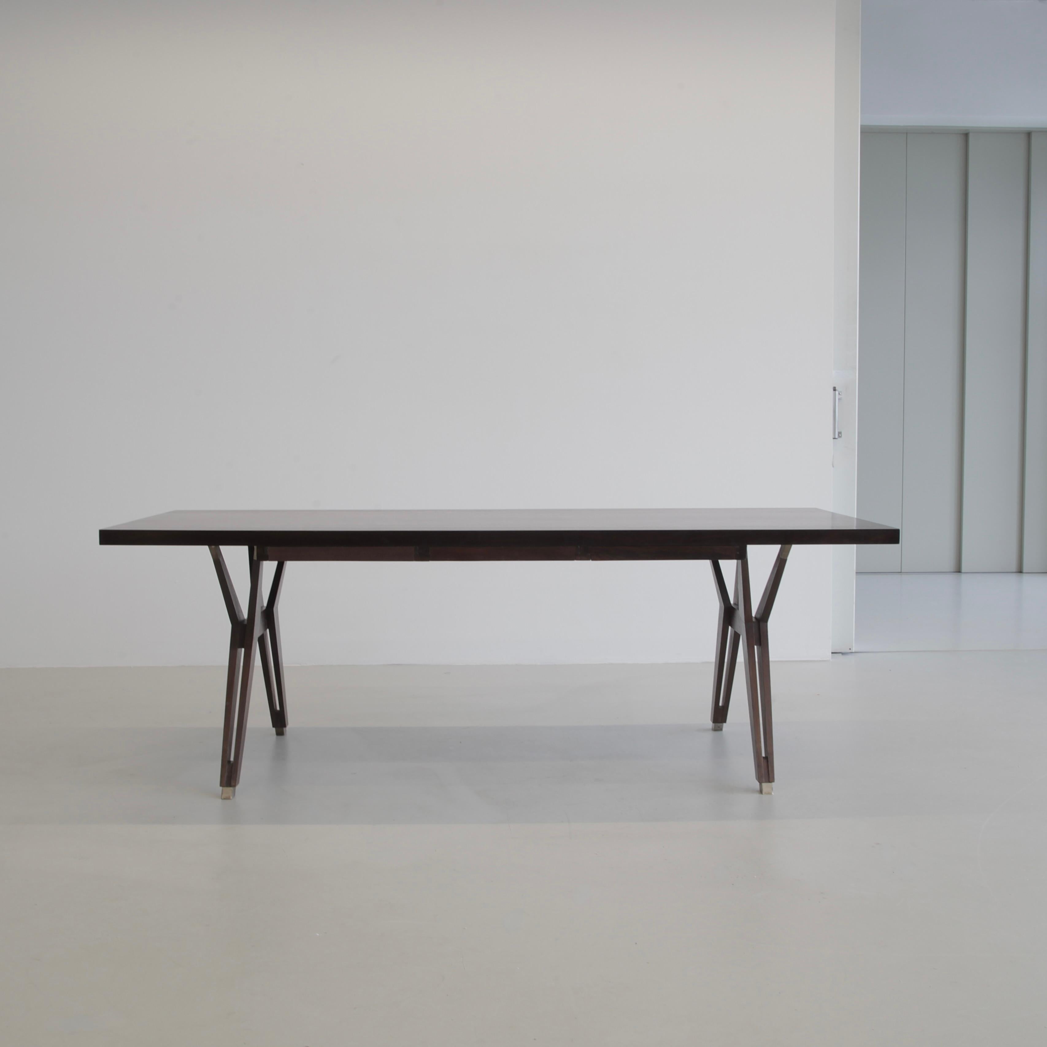Table 'Terni', designed by Ico Parisi. Italy, MIM Roma, 1958.

The wooden table/ desk design by Parisi with an elegant dark wood grain top and three slim wooden drawers can be accessed from one side (these can be removed). Typical Ico Parisi solid