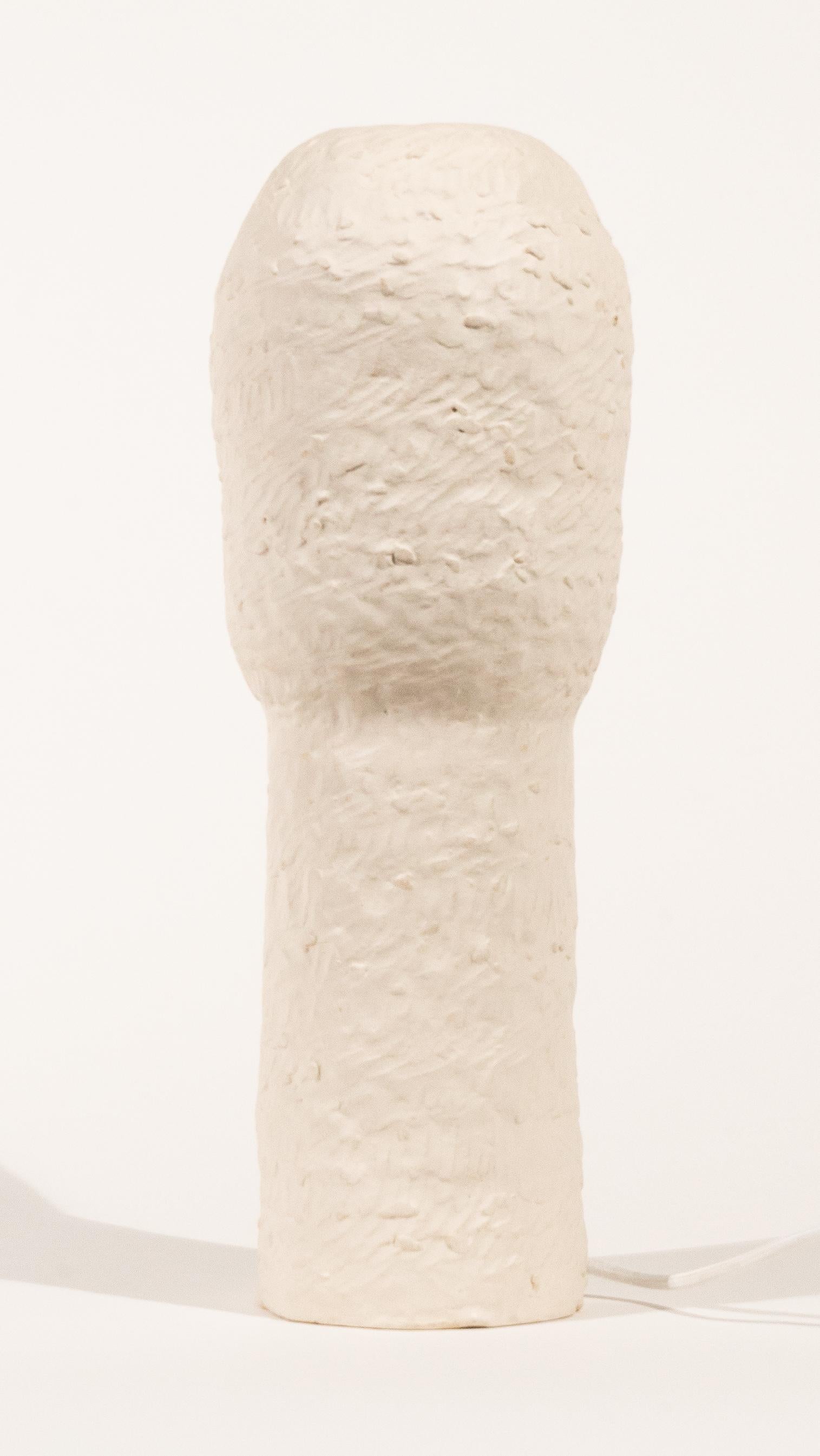 White chamotte stoneware table lamp created by Claire Cosnefroy in 2022. Unique piece, signed, and dated. US and UK electrical wiring available upon request.

Claire Cosnefroy was born in Cotentin in Normandy, from where she keeps a taste for