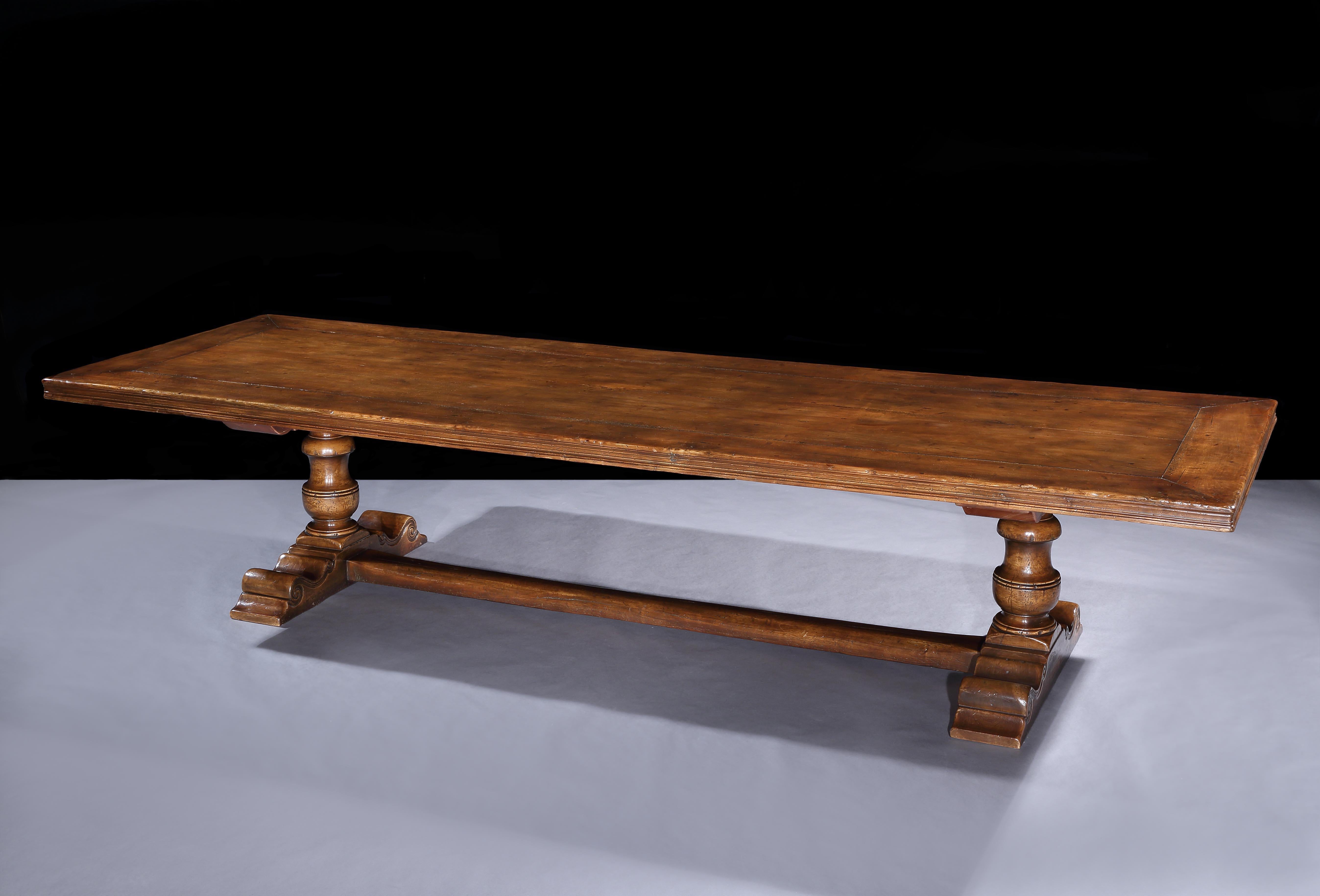 Period long trestle tables are the most practical tables to sit at. They are very hard to source and they tend to be narrow. This is a decorative piece probably only 40 years old or so, but as it is impossible to source period tables of this size
