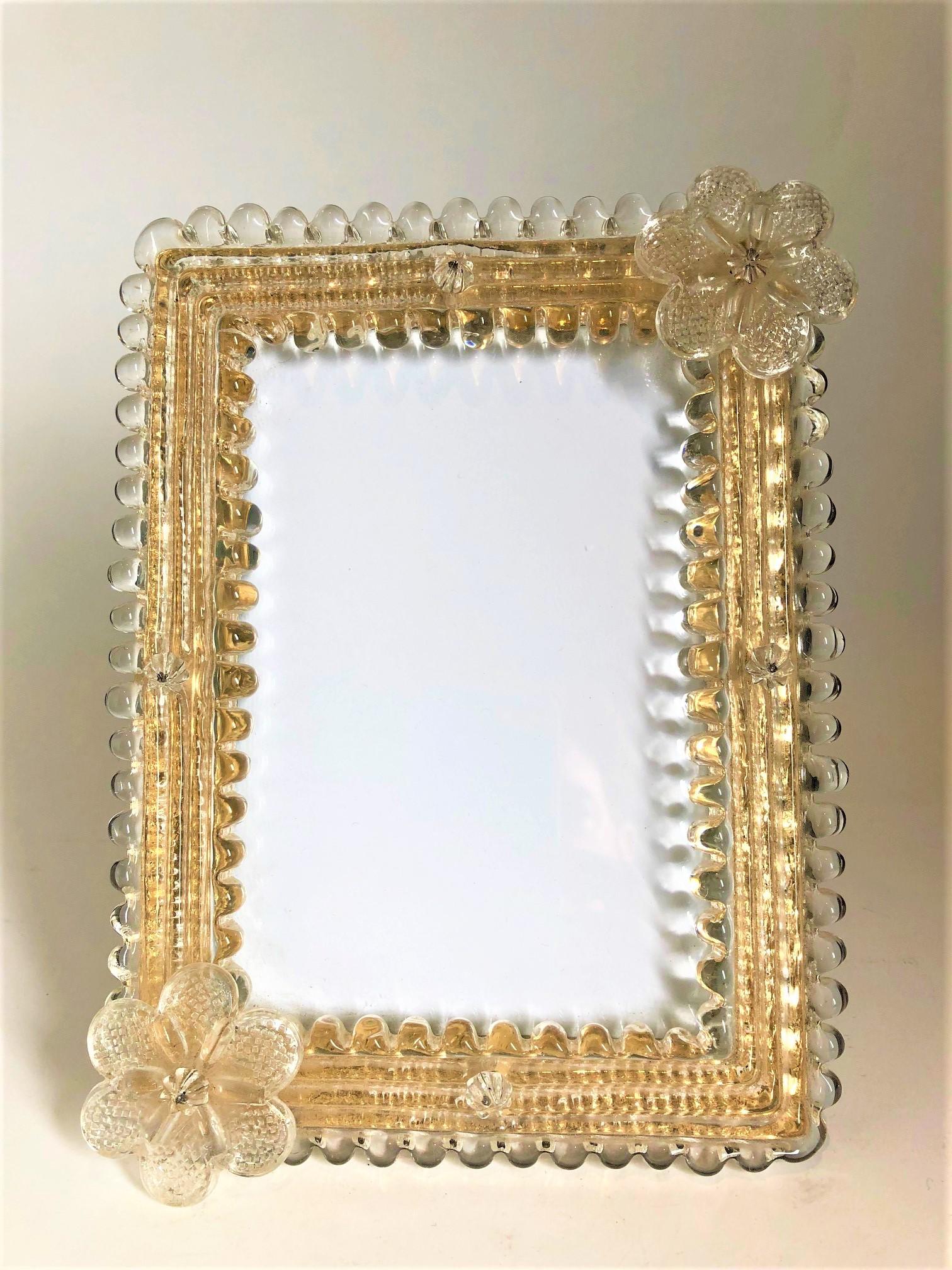 Photograph frame gold Venetian elegant.
Photo frame murano glass flowers, handcrafted, made in murano
Made of murano glass and wood structure.