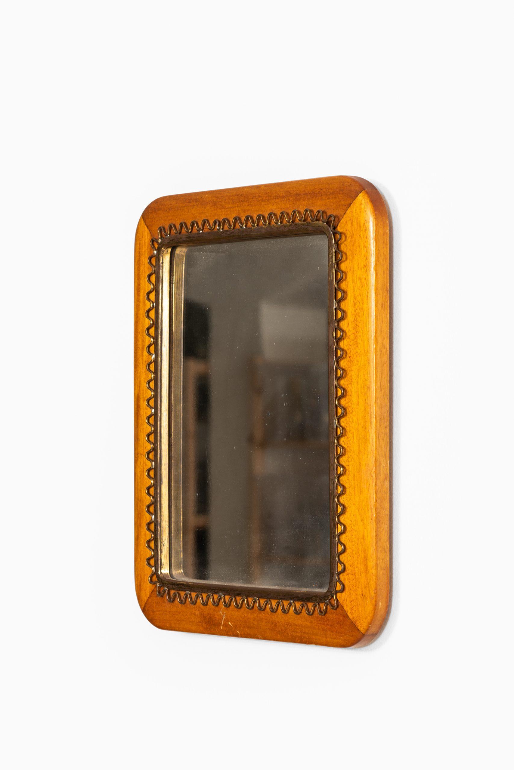 Rare table / wall mirror by unknown designer. Produced by Svenskt Tenn in Sweden.