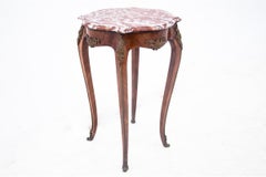 Table with a marble top, France, around 1880.