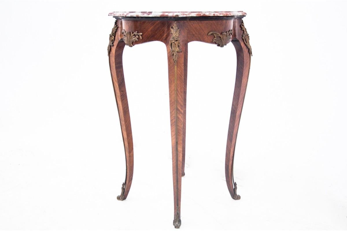 Marble Table with a marble top, France, around 1910. For Sale
