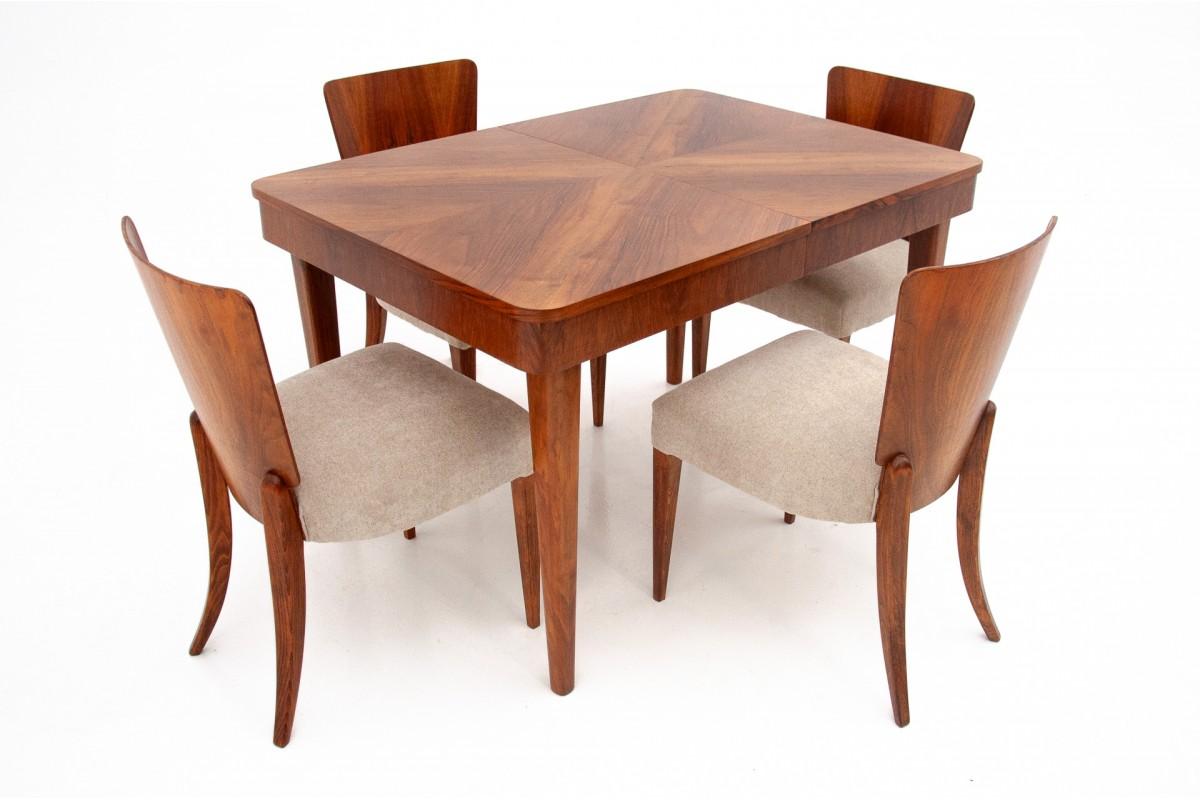 Rectangular extendable table with chairs designed by J. Halabal, Czechoslovakia.

Furniture in very good condition, after professional renovation. The seats of the chairs have been covered with new fabric

Dimensions: height 76 cm / length 120 - 170