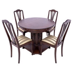 Table with chairs from the early 20th century.