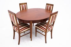 Table with chairs in Empire style, France.