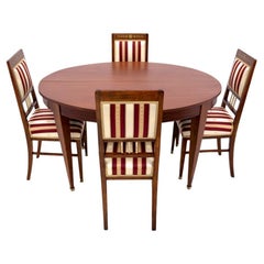 Table with chairs in Empire style, France.