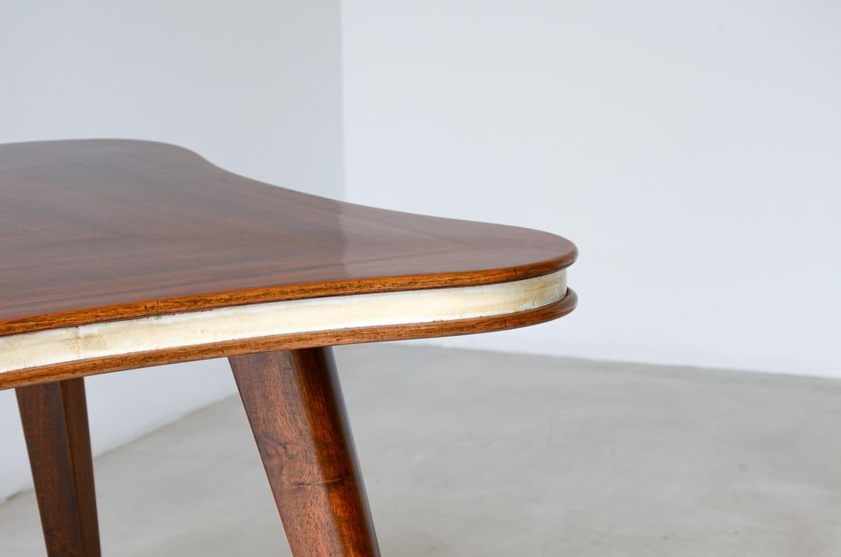 Italian Table with cloverleaf top in veneered walnut and parchment profile For Sale