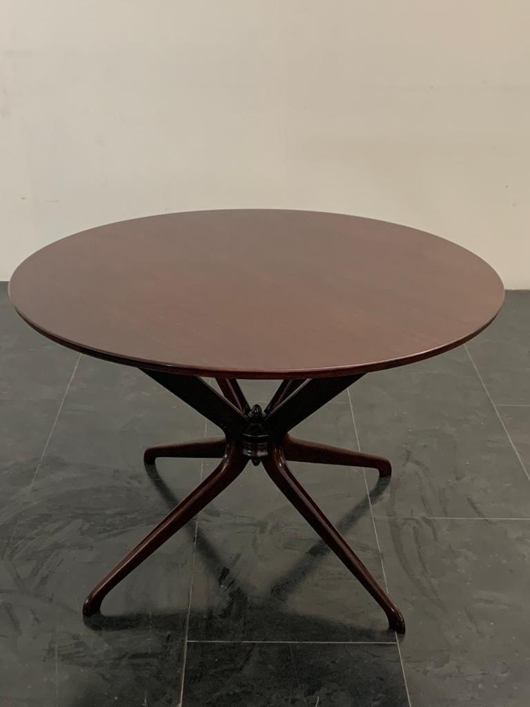 Round table attributed to Ico and Luisa Parisi, 1950s. Rosewood top and rosewood-stained beech legs.
Piece attributed to the above designer/maker. It has no hallmark or proof of authenticity, but is documented in design history. I take full