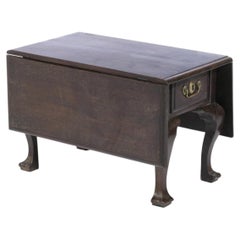 Table with flaps, in wood - 18th century