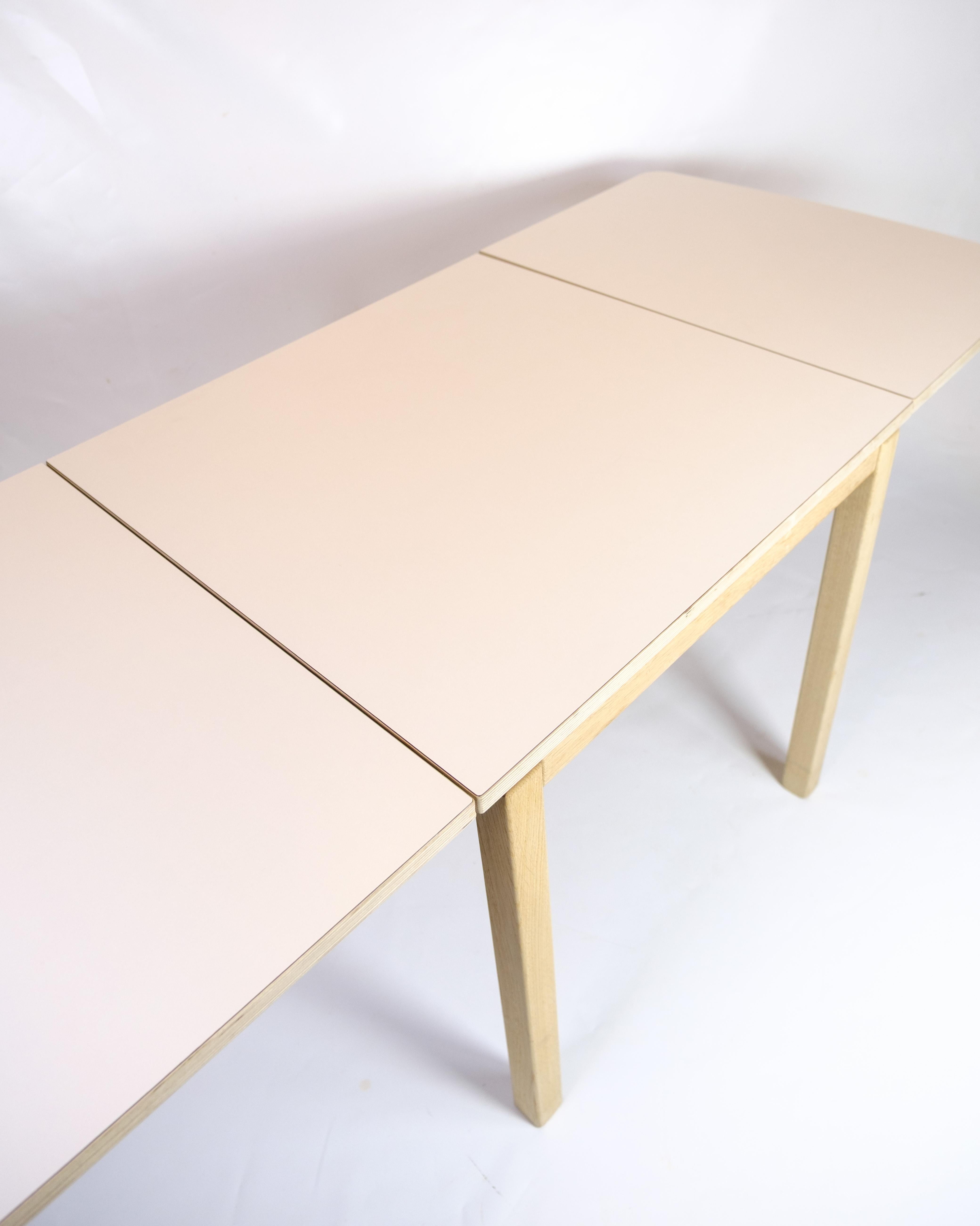 Danish Table With Flaps Model 517 Made In Oak & With White Top Laminate For Sale