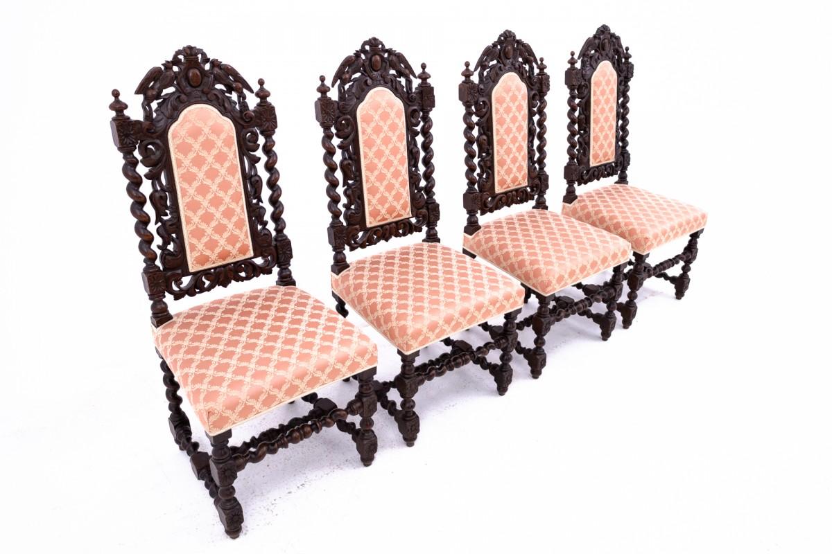 The antique set of chairs and a table in the Renaissance style were made of oak wood in the second half of the 19th century. Seats and backrests of chairs upholstered with fabric, wooden legs, spirally turned. The rectangular table top is supported