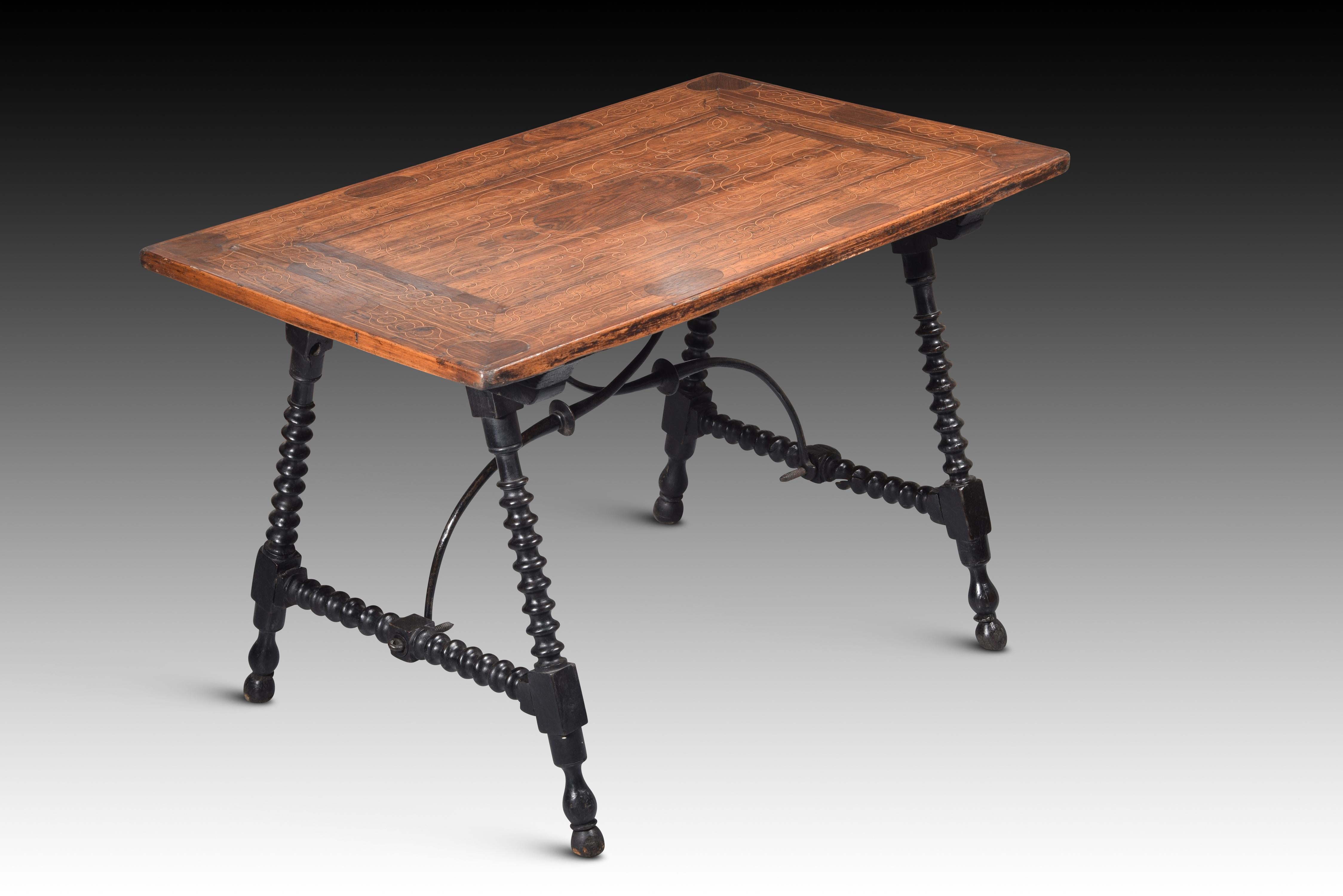 European Table with marquetry top. Wood, iron.  18th century. For Sale