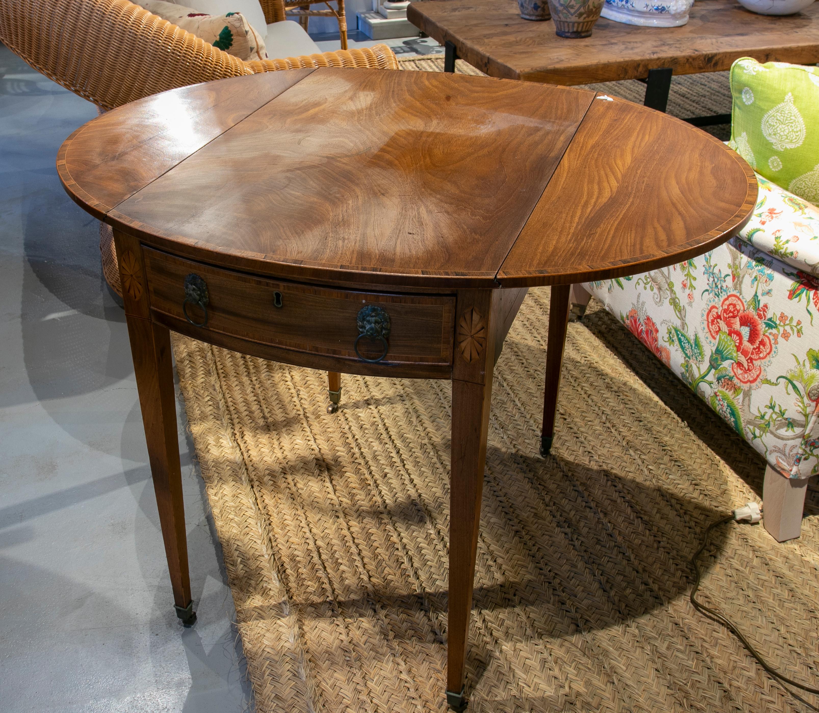 Table with Wings and Drawers on the Sides with Folding Laterales and Handles 2