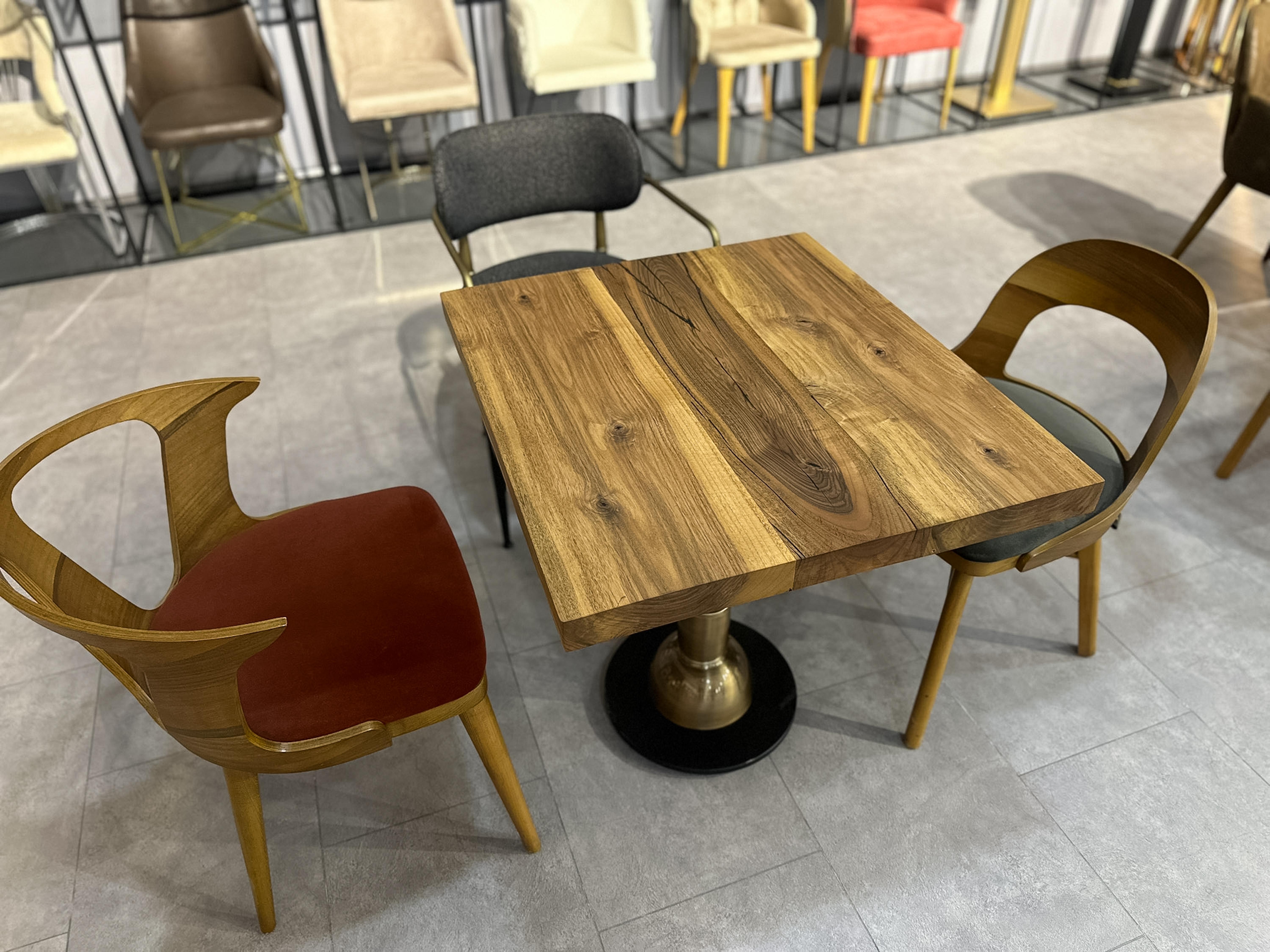 Custom Walnut Live Edge Kitchen Table 

This table is made of Walnut Wood. The grains and texture of the wood describe what a natural walnut woods looks like.
It can be used as a dining table or as a conference table. Suitable for indoor use.

All