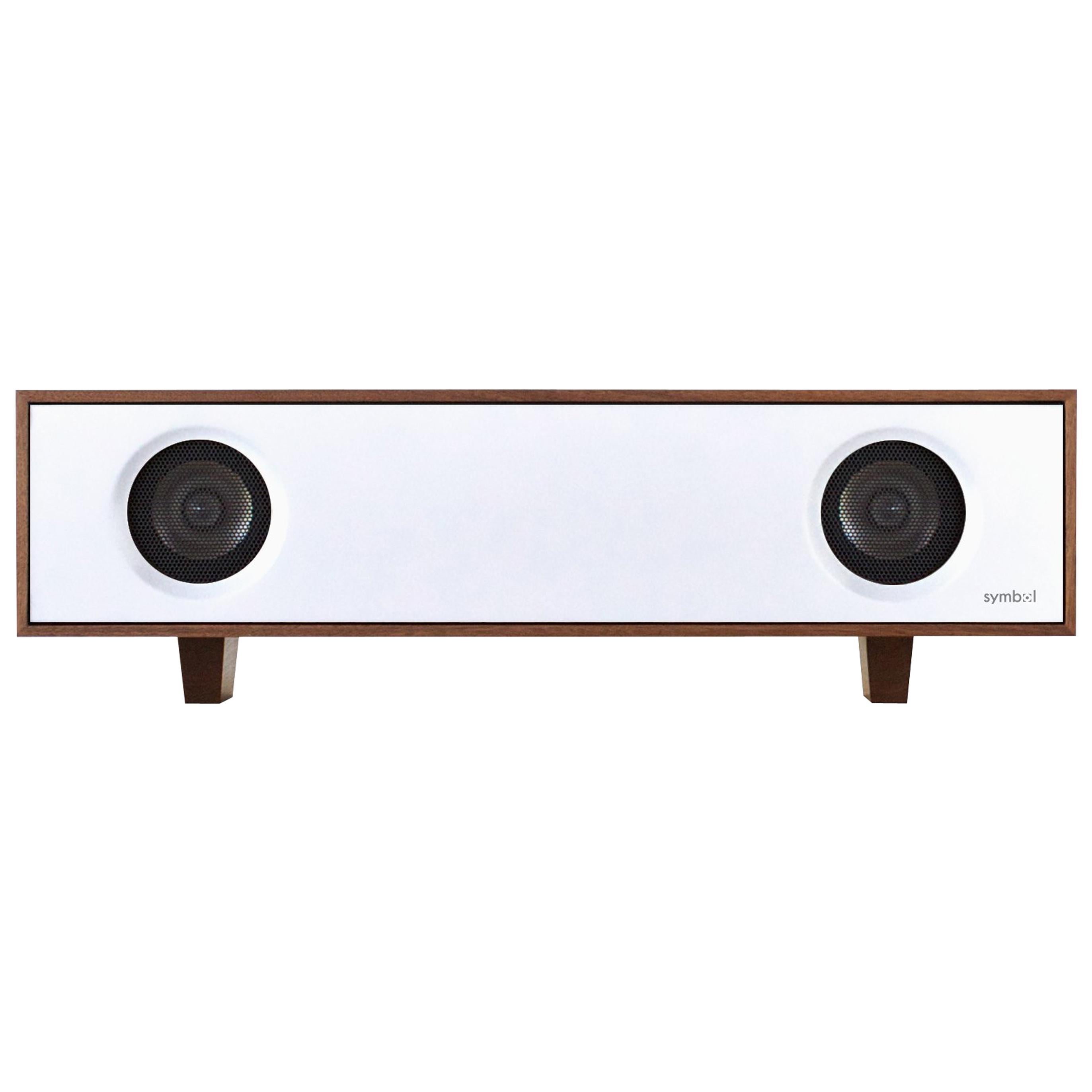 The tabletop HiFi is an amplified speaker cabinet that delivers a pure, rich sound from any audio source. The stereo cabinet is handcrafted in New York's Hudson Valley in a variety of lacquer finishes mixed with natural solid wood. Designed by