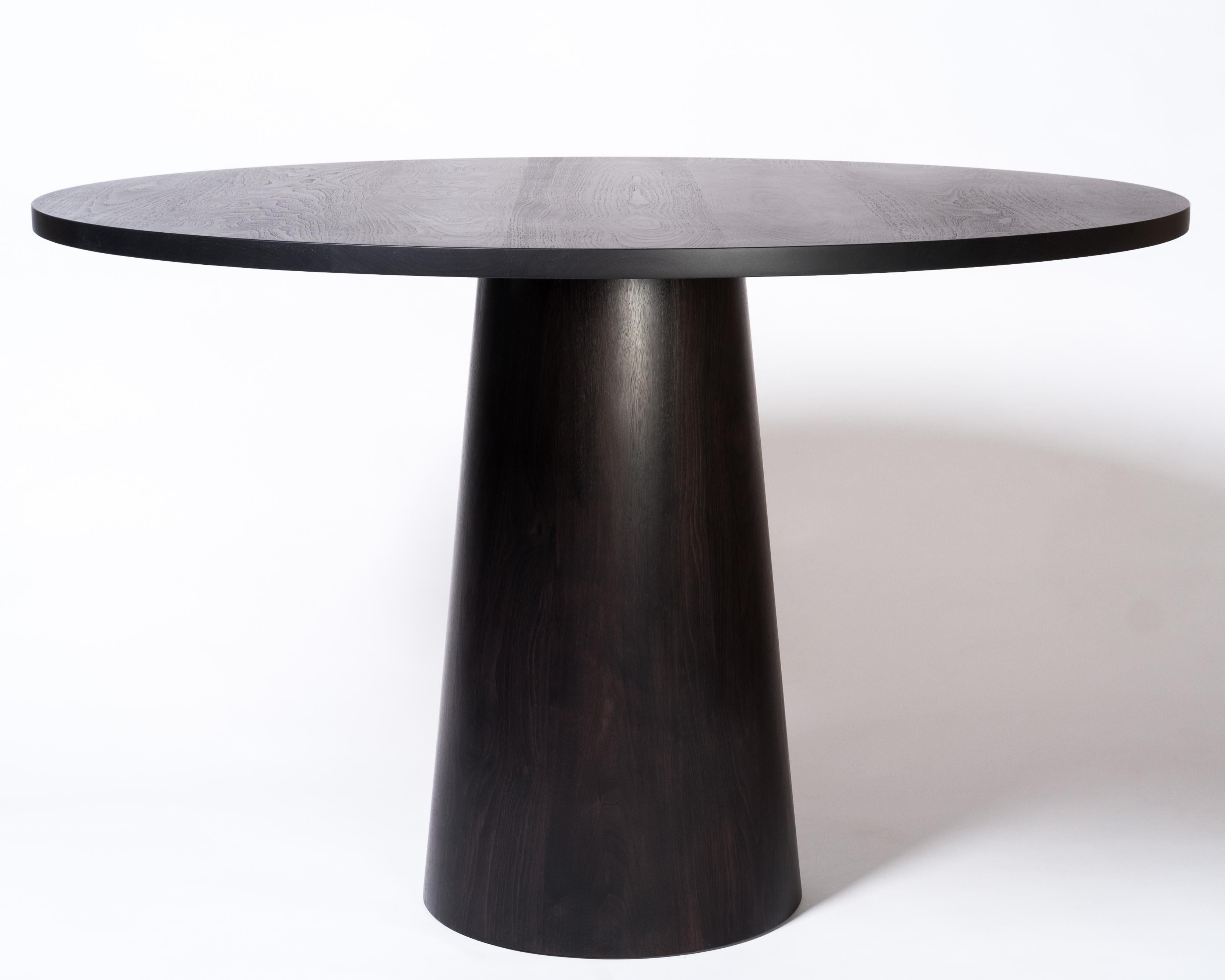 black pedestal dining table