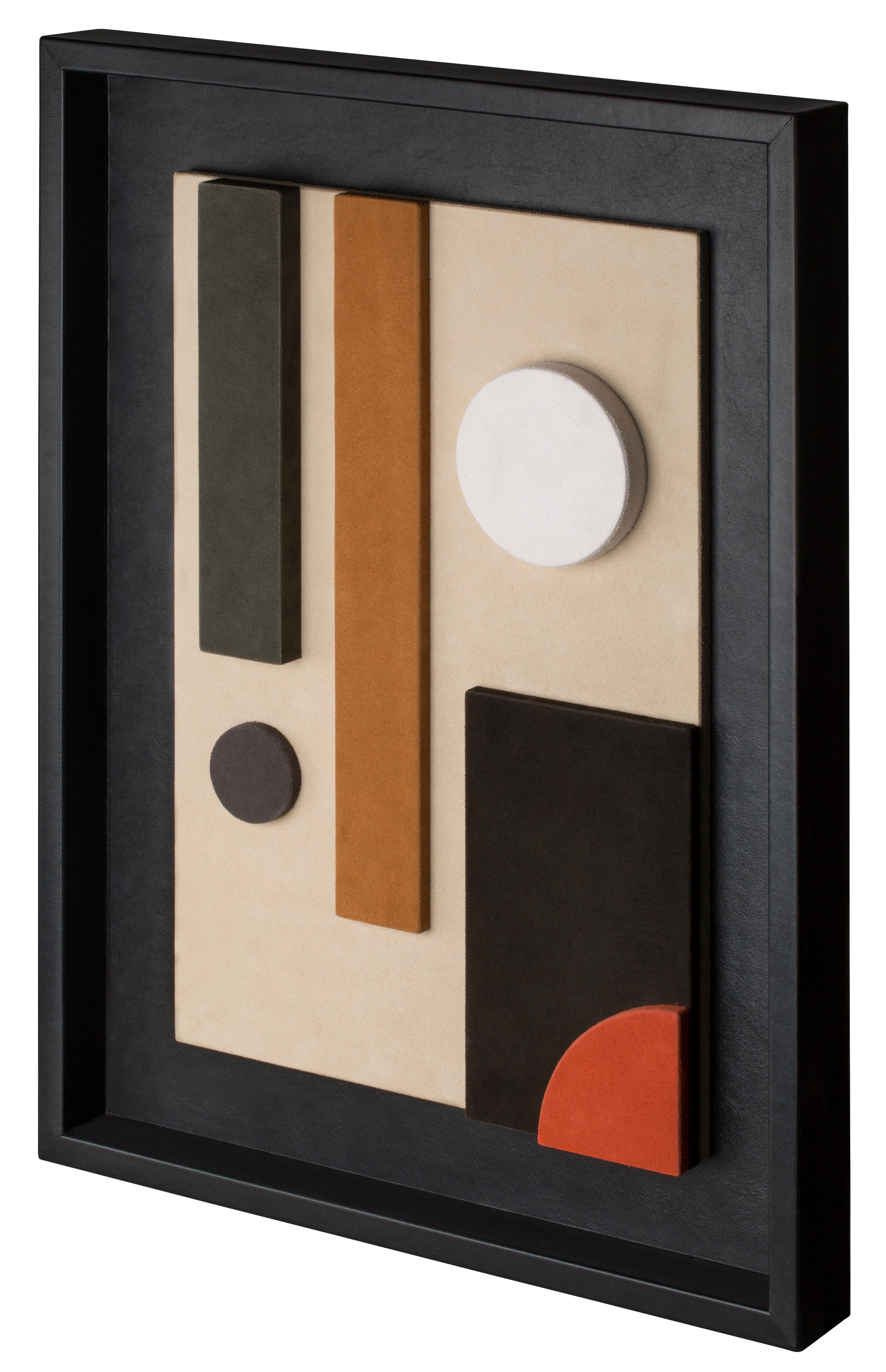 This suede-covered wall sculpture is framed in black nappa.
The interaction between colors and shapes makes it a decorative piece based on pure geometry, where abstraction and figuration create formal structures that allow color to dominate. This