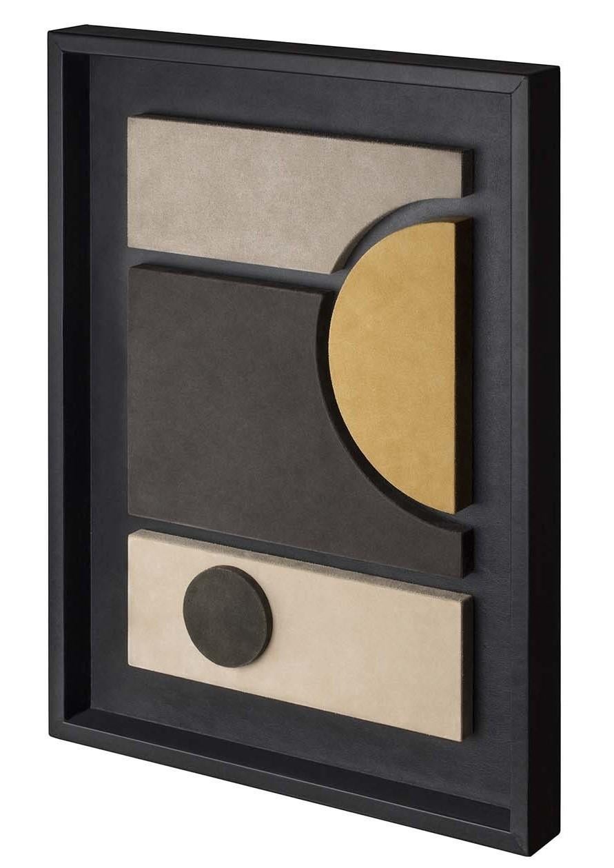 A stunning example of modern abstract art, this superb wall sculpture blurs the lines between abstraction and figuration to create a bold work of art. Dominated by sleek lines and colors, basic forms are covered in a soft suede, with an orange