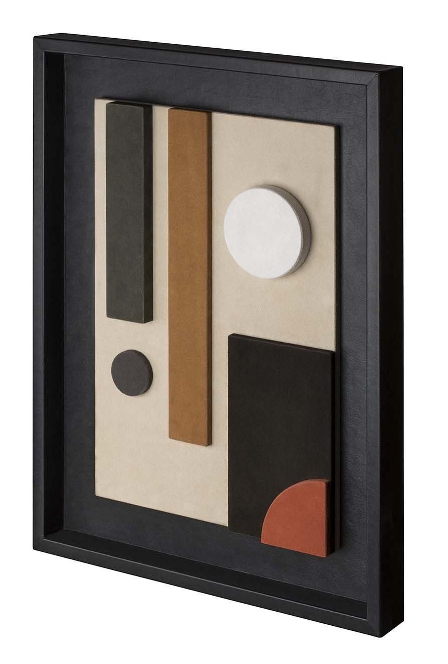 Defined by luxurious simplicity and a captivating design that merges Space Age style with tribal inspiration, this wall sculpture will be the focal point in a modern and contemporary interior. Entirely crafted of leather, the frame is in black nappa
