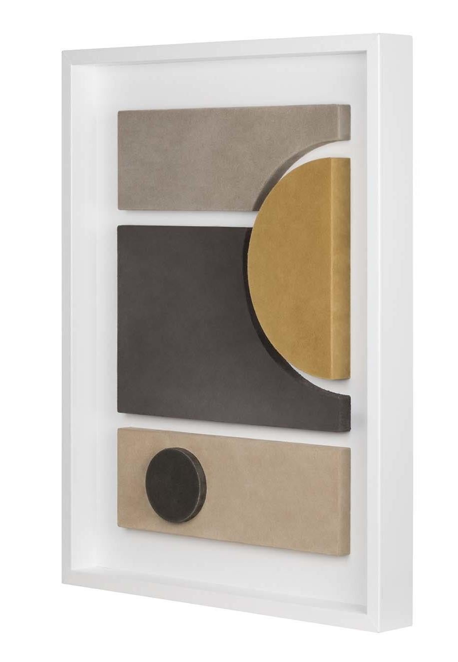 A true piece of art that will make a statement in a contemporary interior, this wall sculpture is masterfully crafted of leather from an Exclusive Design by Gio Bagnara. Creating the perfect interaction between geometric shapes and colors, this