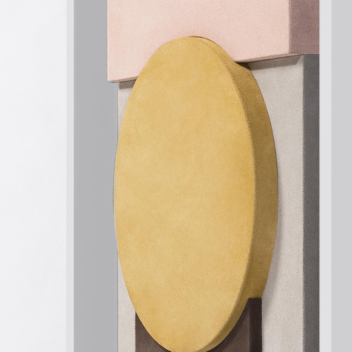 This abstractionist wall sculpture is distinguished for its deft use of geometries to create an architectural work of art for a contemporary or Minimalist decor. Geometric shapes are upholstered in a soft suede leather, with a central orange circle