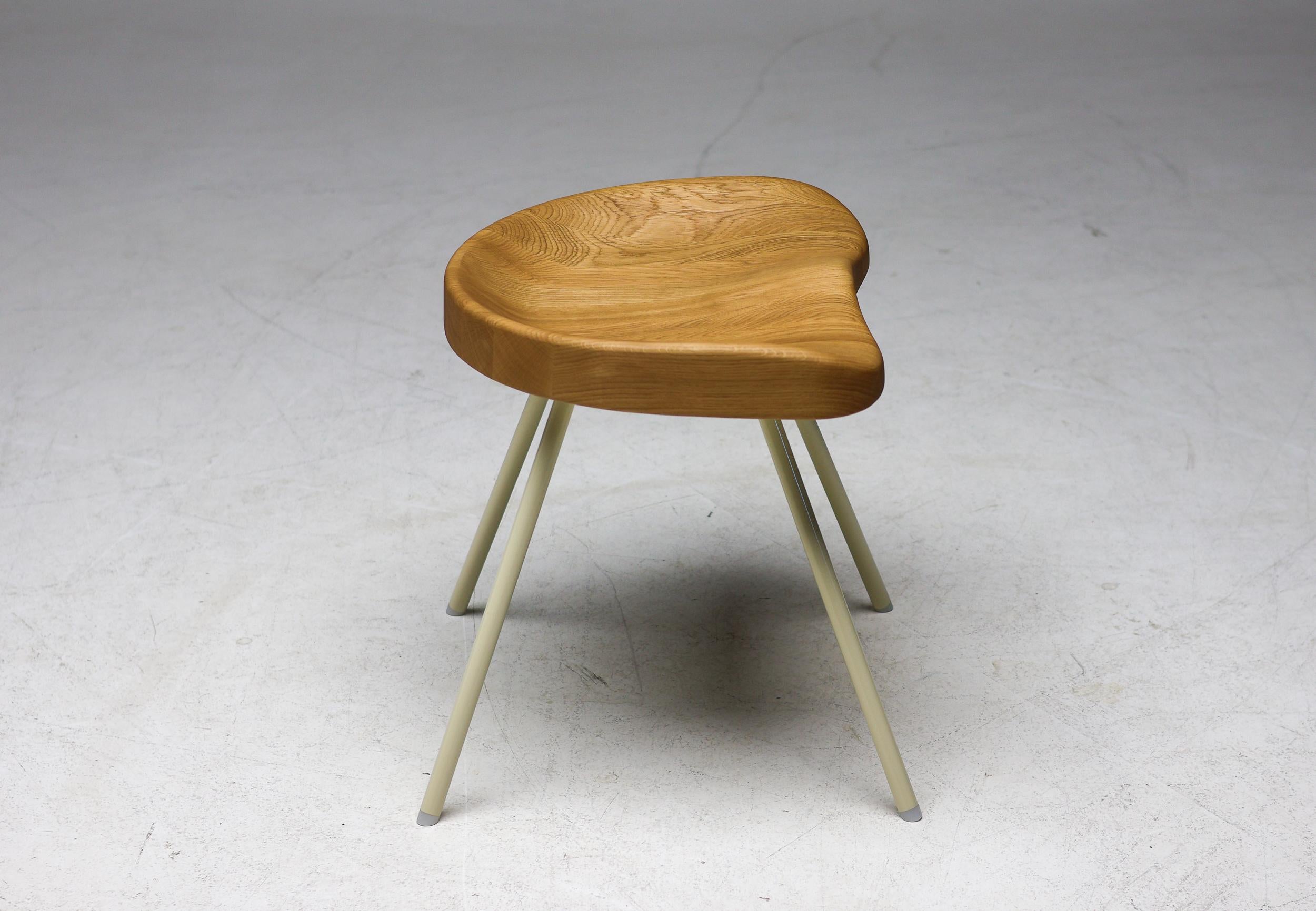 Tabouret No. 307 in oak with tubular steel legs, designed by Jean Prouvé in 1951.
Marked with Vitra label.

Jean Prouvé (1901-1984) was a French architect, designer, and builder, renowned for his innovative use of industrial materials and methods.